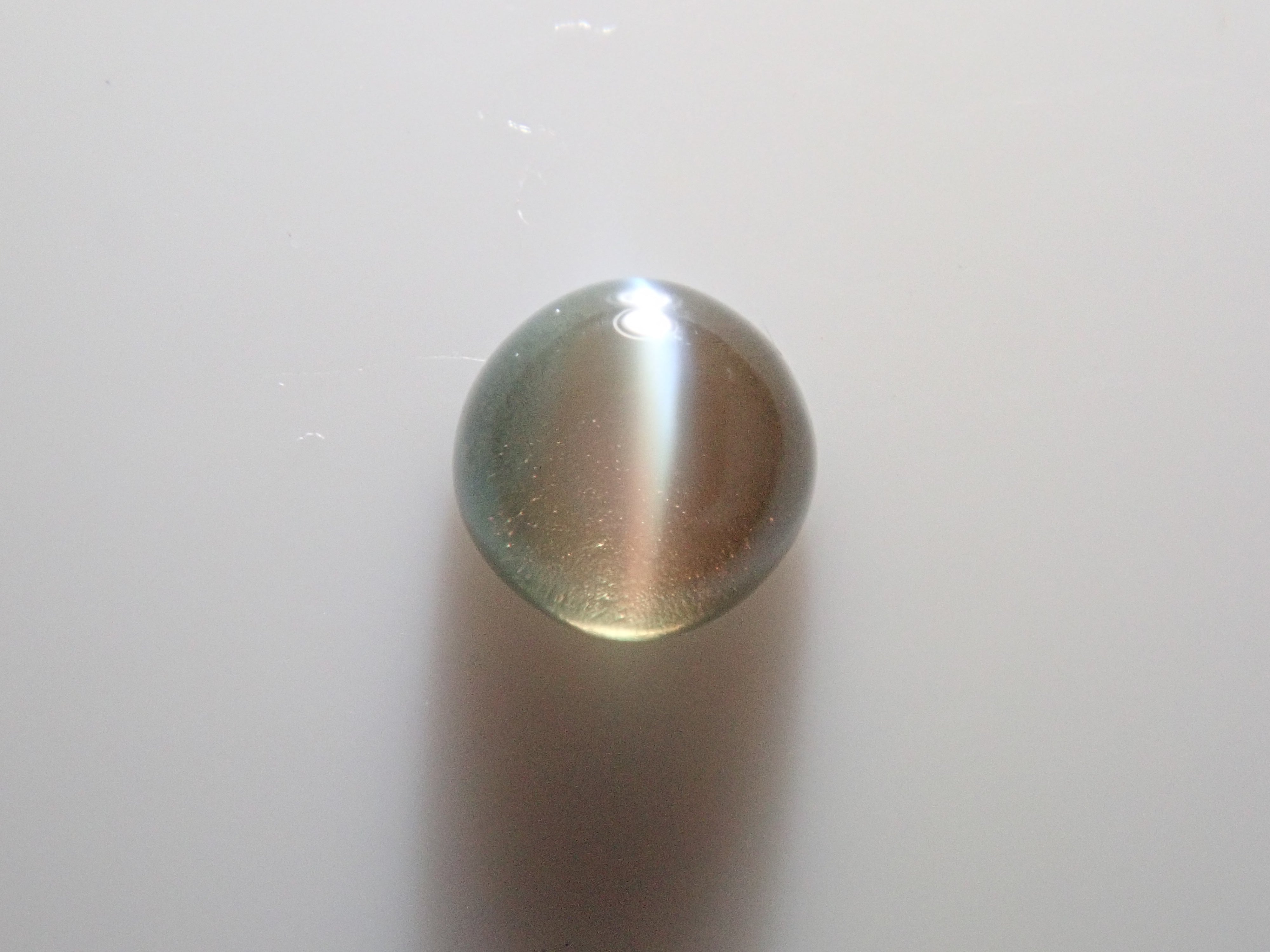 【12562658掲載】ブラジル産アレキサンドライトキャッツアイ 0.097ctルース