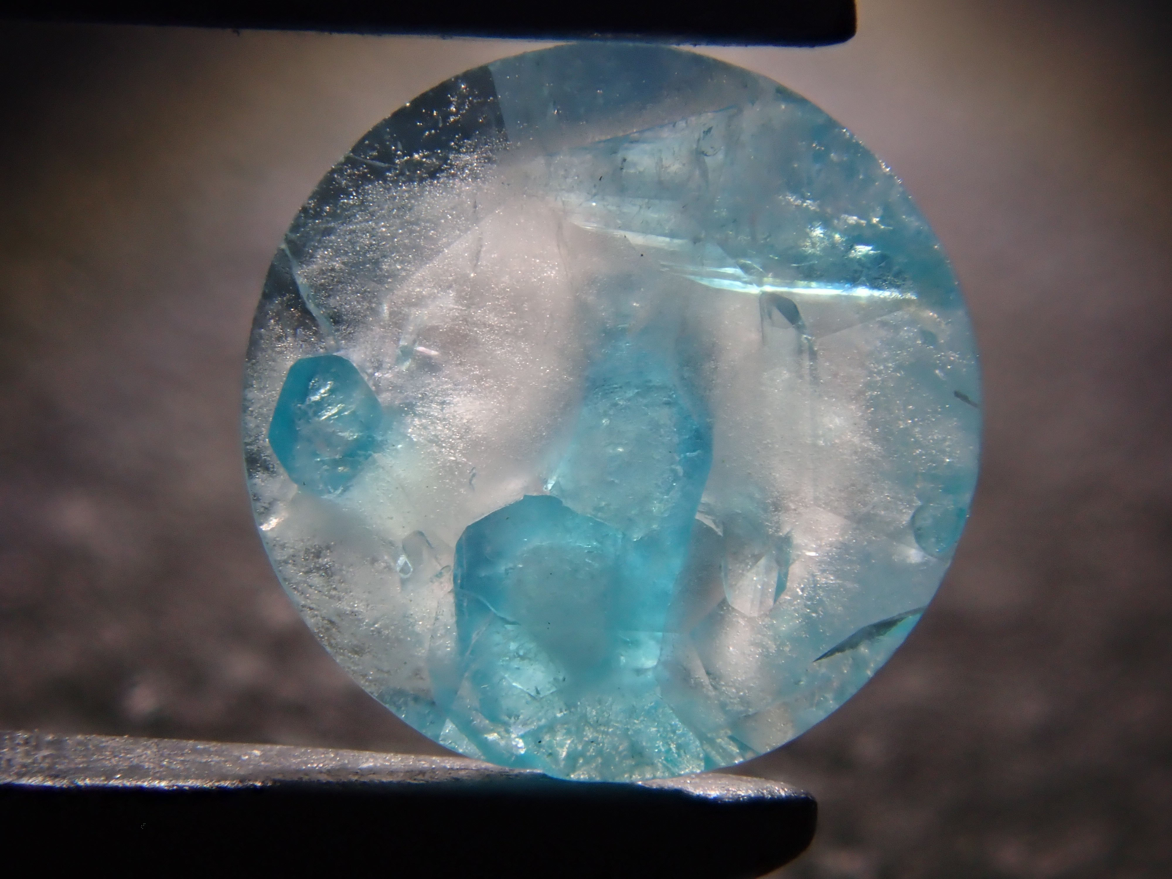 【12555695掲載】ブラジル産パライバトルマリンインクォーツ 0.313ctルース