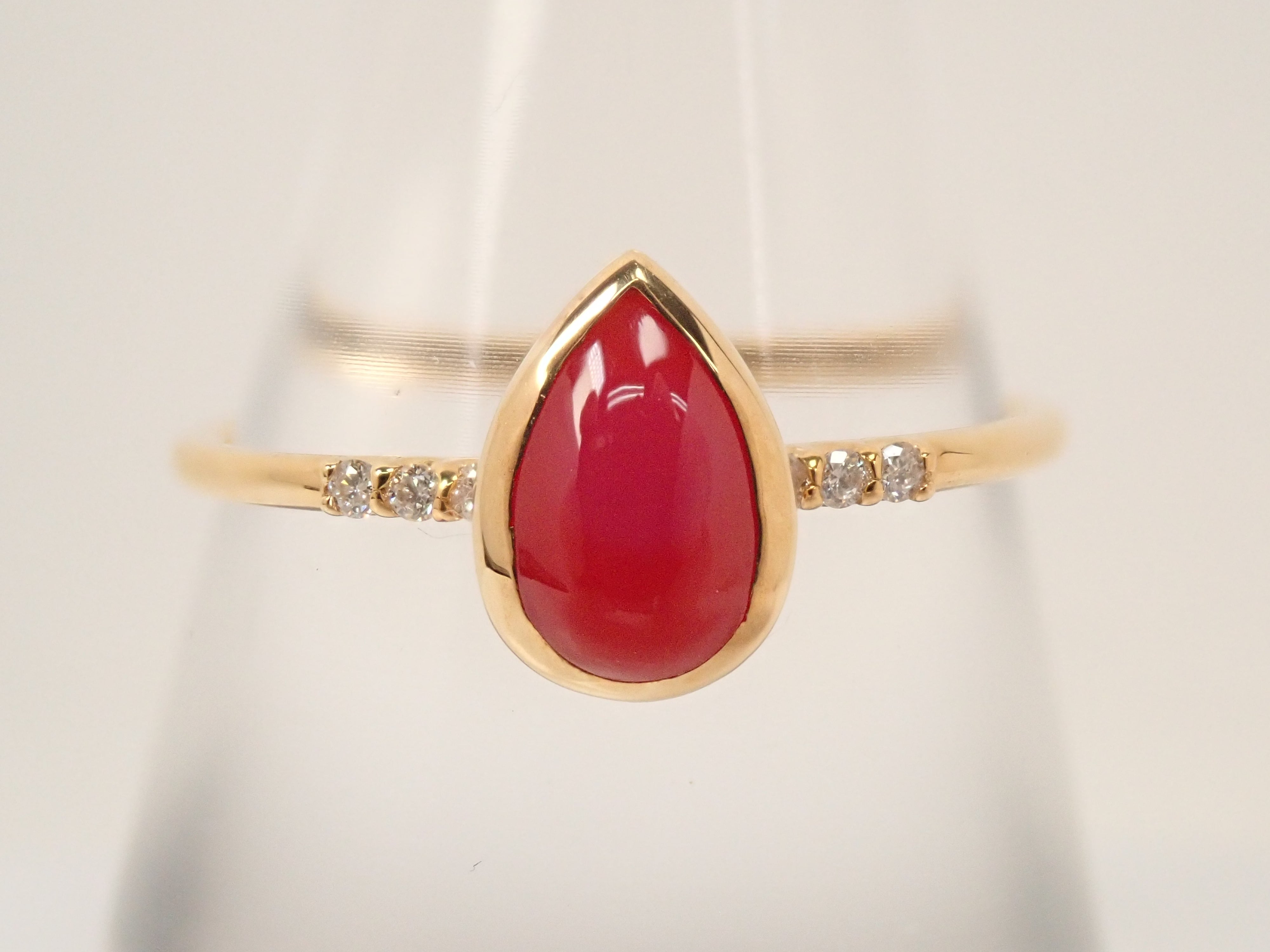 【22602551掲載】K18 血赤珊瑚 0.56ct リング