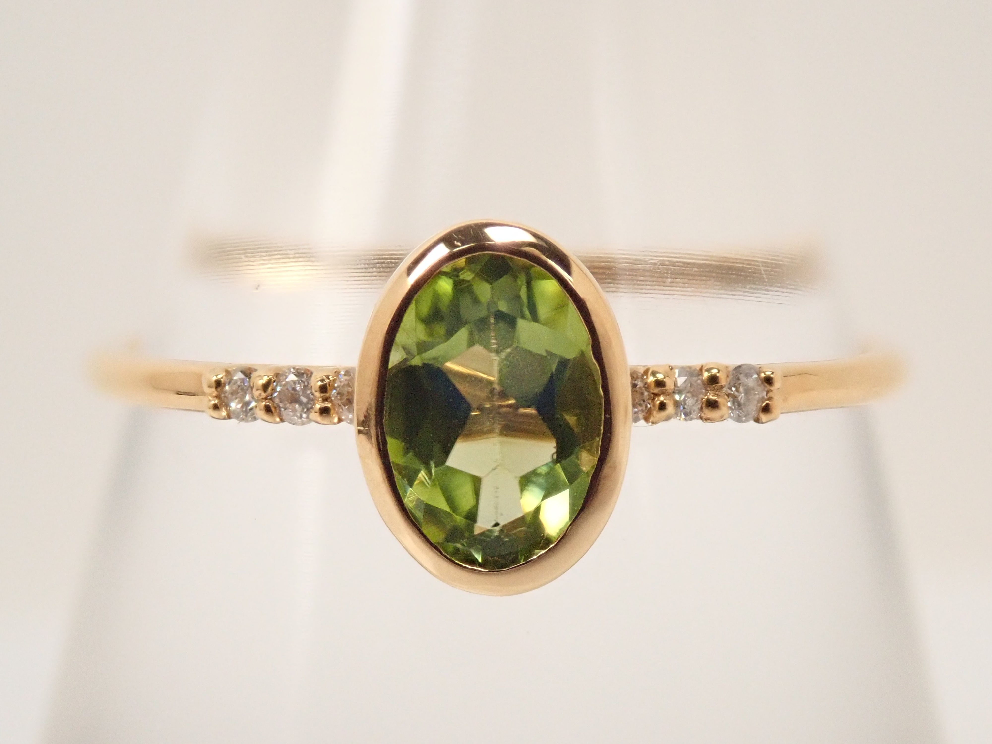 【22602554掲載】K18 ペリドット リング