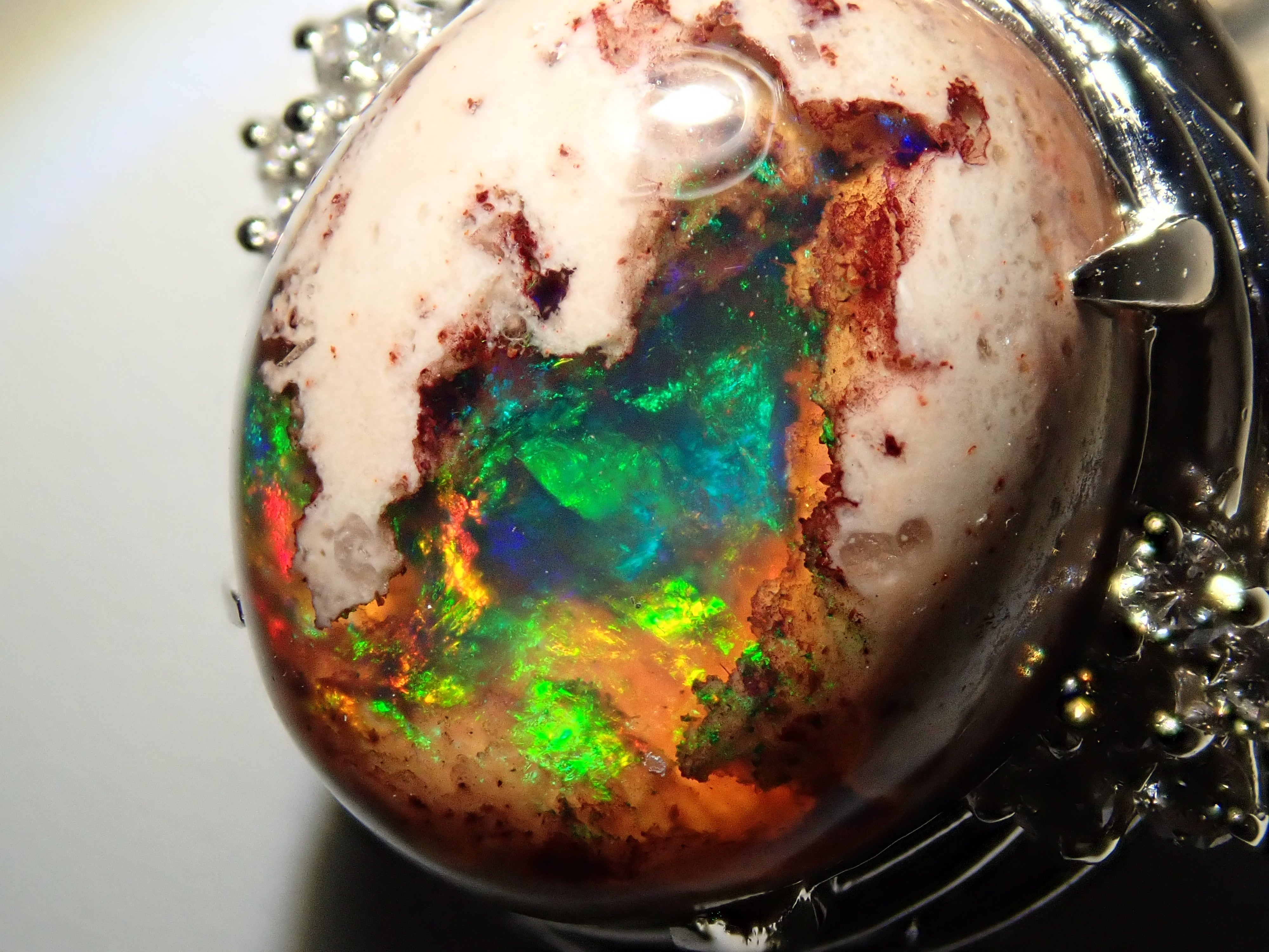 【22602560掲載】【カラフリ】Pt900 カンテラオパール 7.809ctct リング