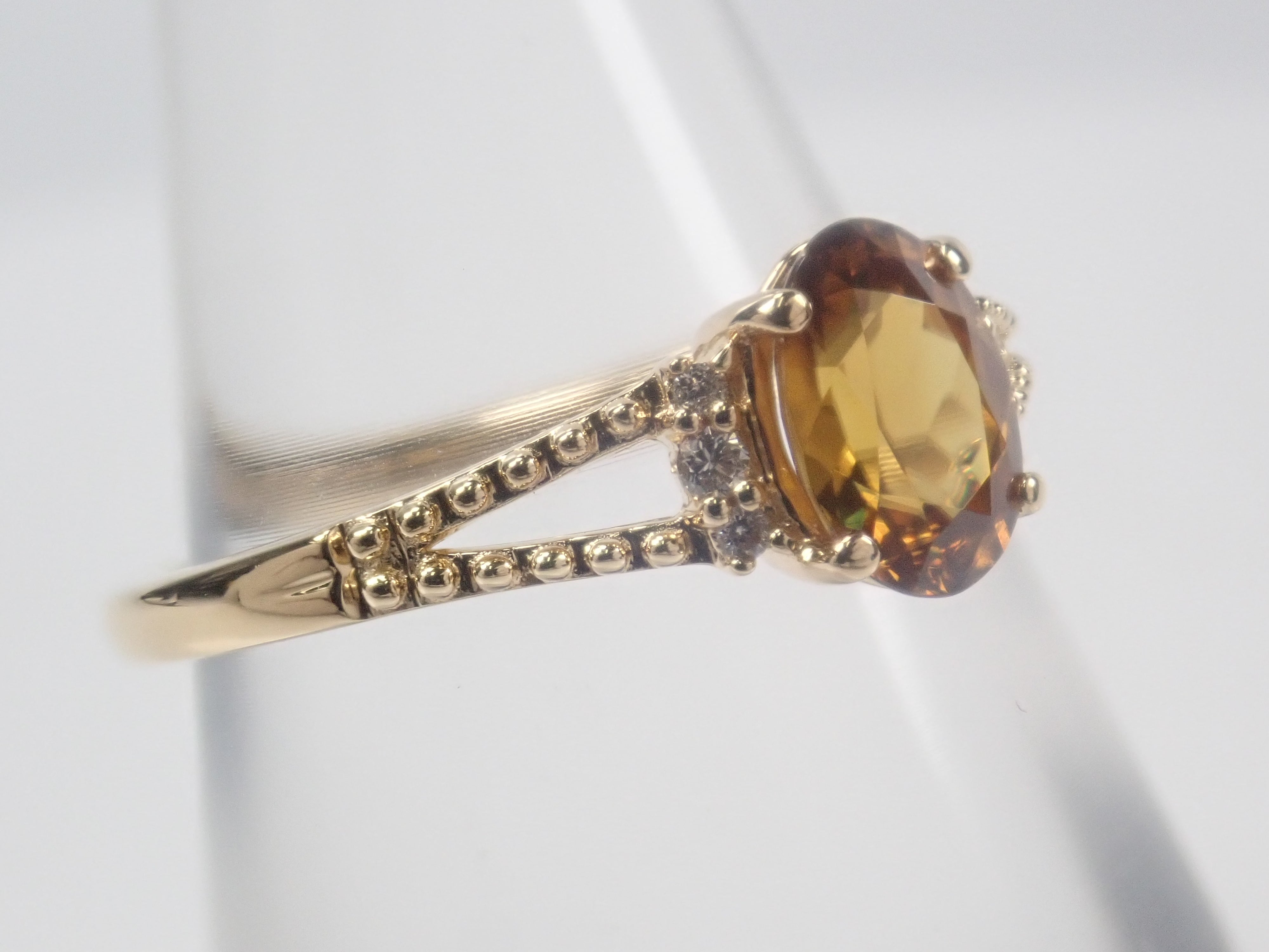 【22602582掲載】【カラフリ】K18 スフェーン 0.7ct リング