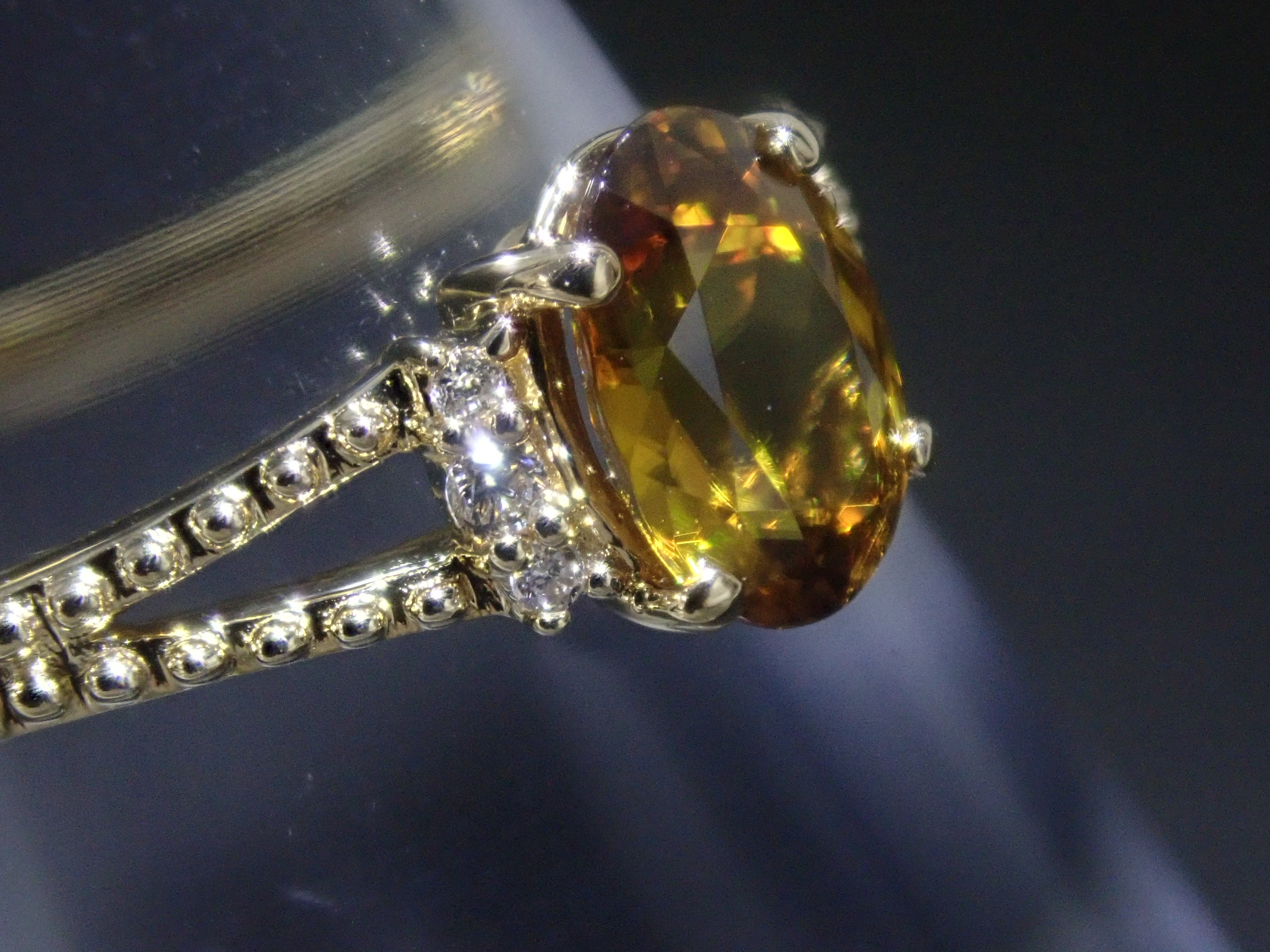 【22602582掲載】【カラフリ】K18 スフェーン 0.7ct リング