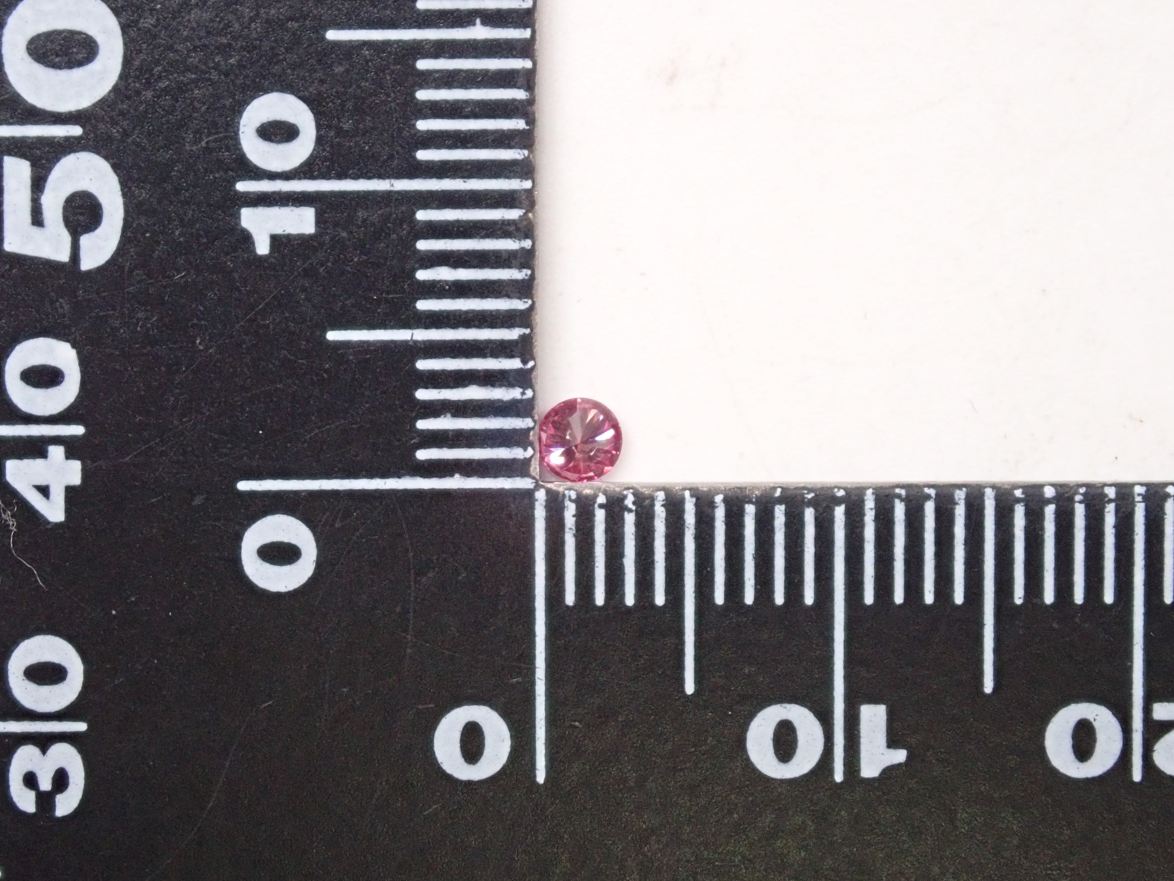 ピンクダイヤモンド(トリートメント) 0.095ctルース(FANCY PURPLISH PURPLISH PINK, SI1)