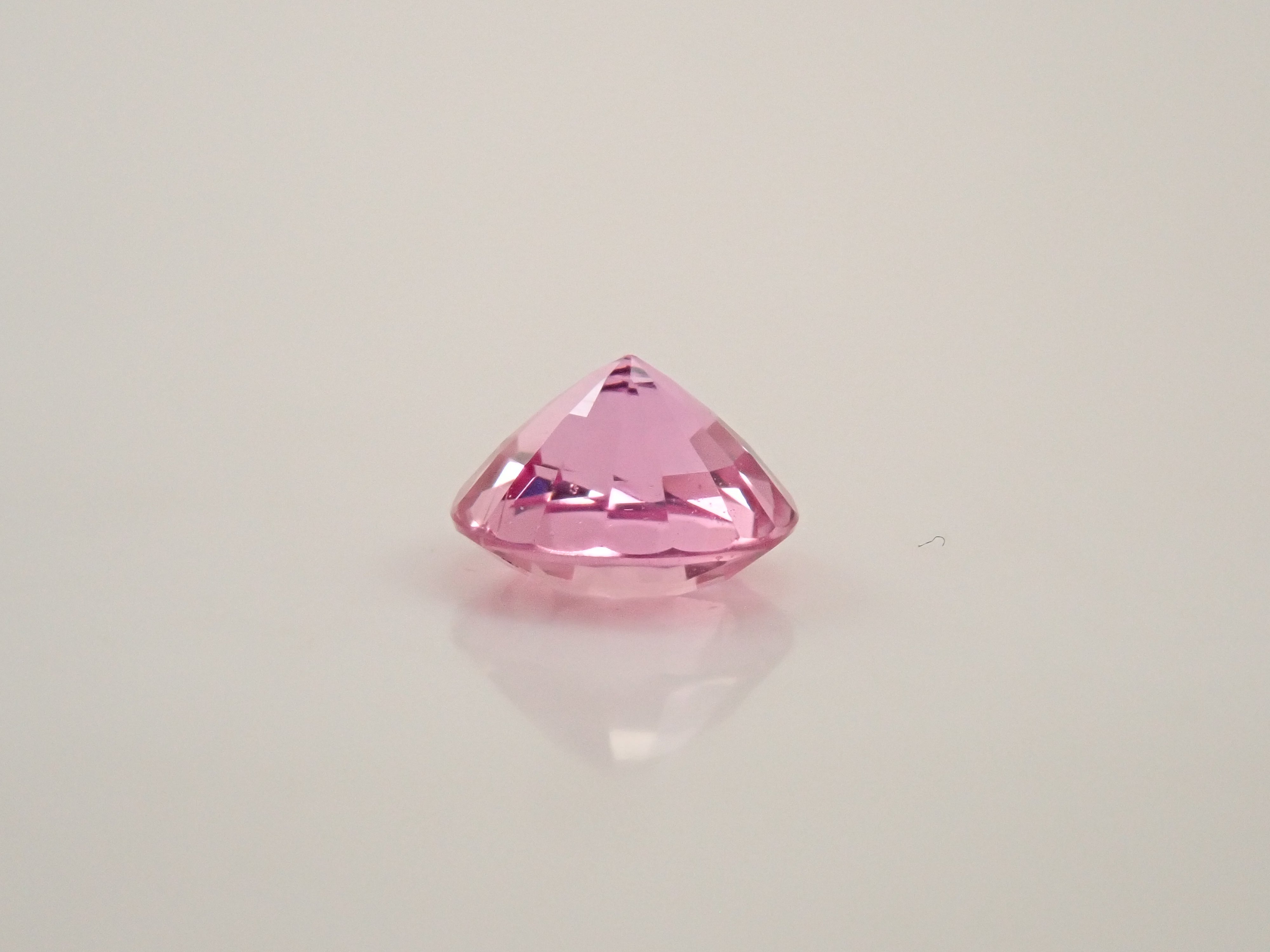 【12563116掲載】マダガスカル産パパラチアサファイア 0.296ctルース