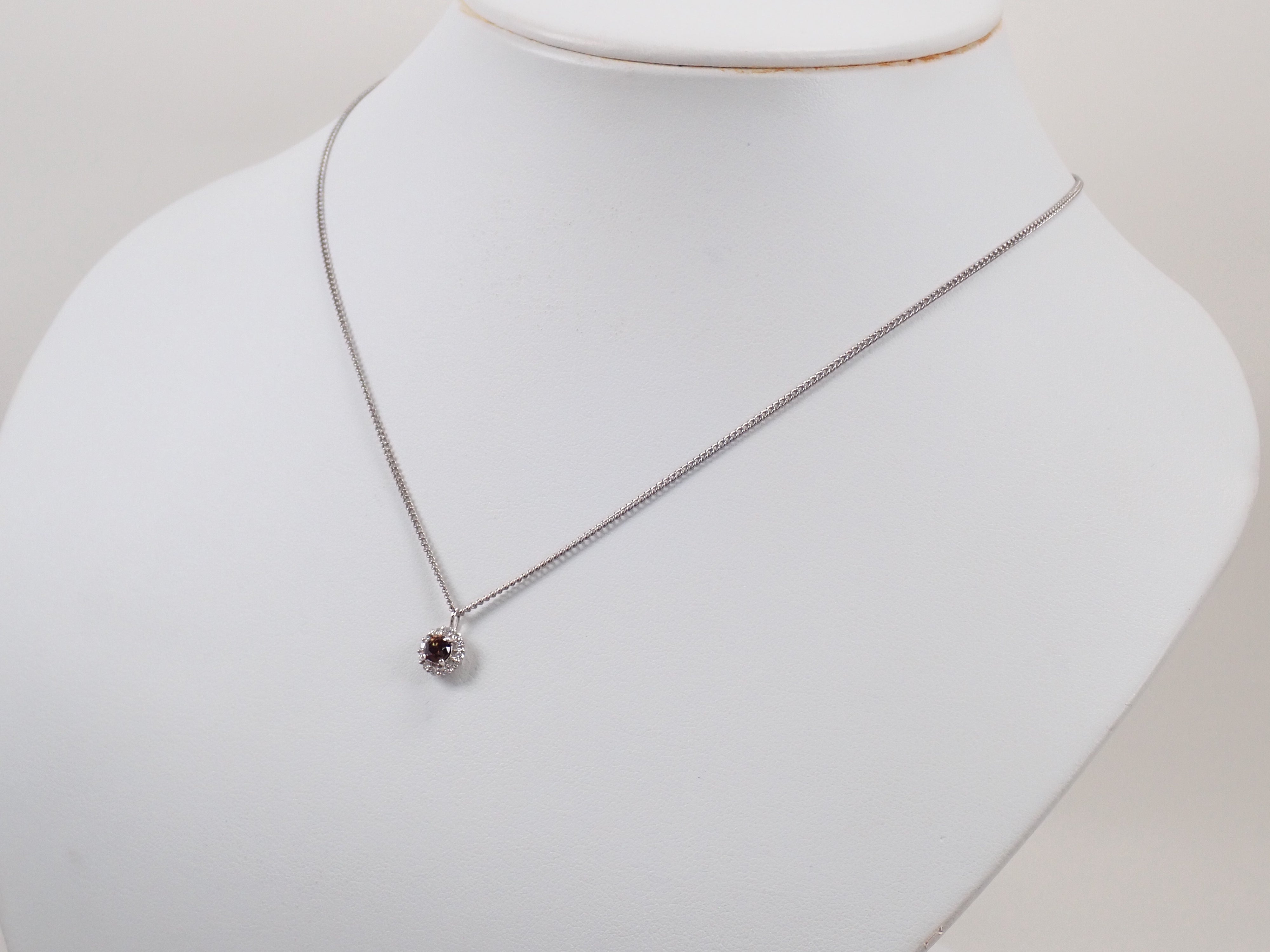 【抽選販売0812_03】Pt900 中国・雲南省産キャシテライト 4mm/0.57ct ・ダイヤモンド0.16ctペンダントトップ(ネックレストップ)鑑別書