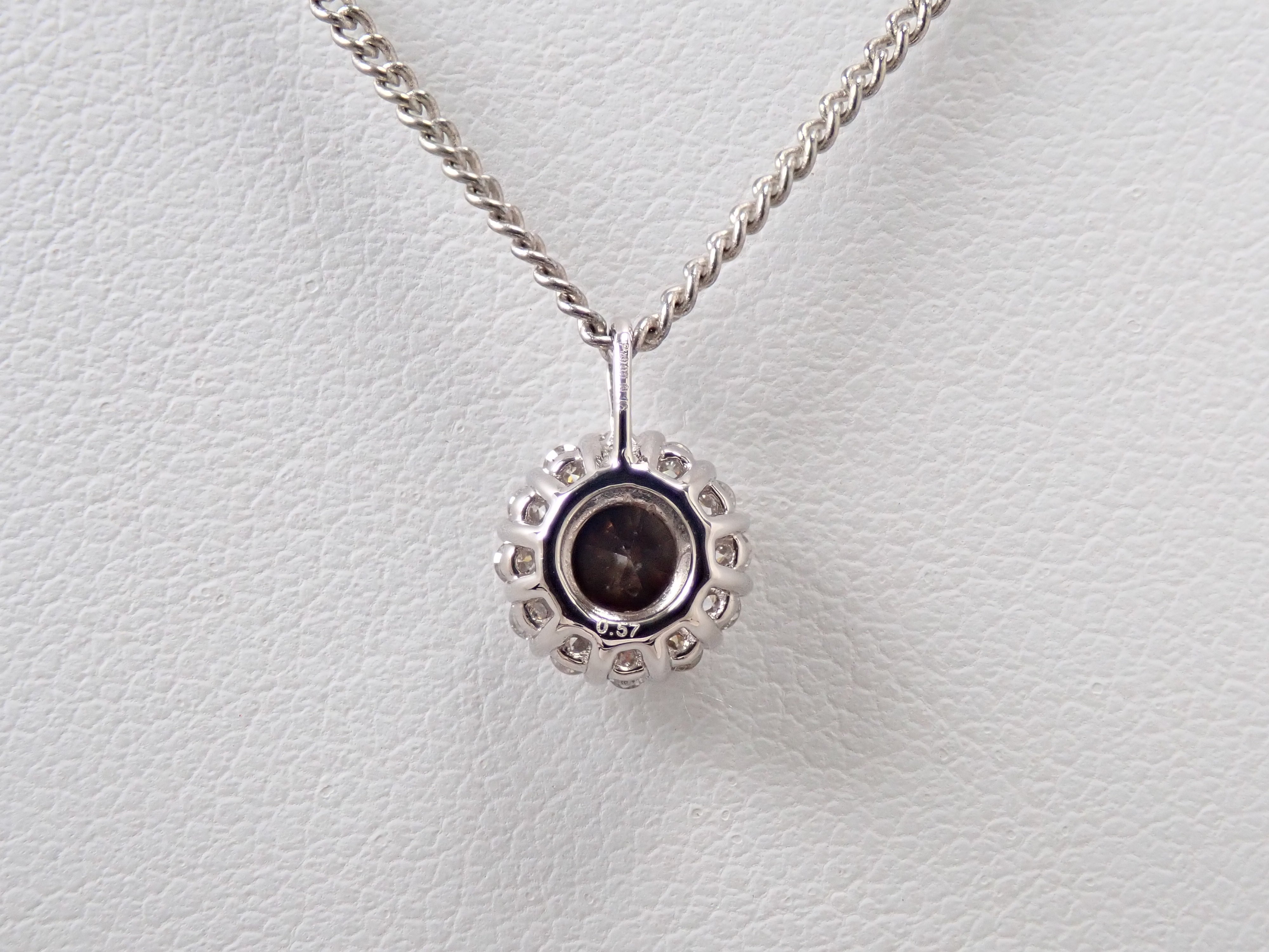 【抽選販売0812_03】Pt900 中国・雲南省産キャシテライト 4mm/0.57ct ・ダイヤモンド0.16ctペンダントトップ(ネックレストップ)鑑別書