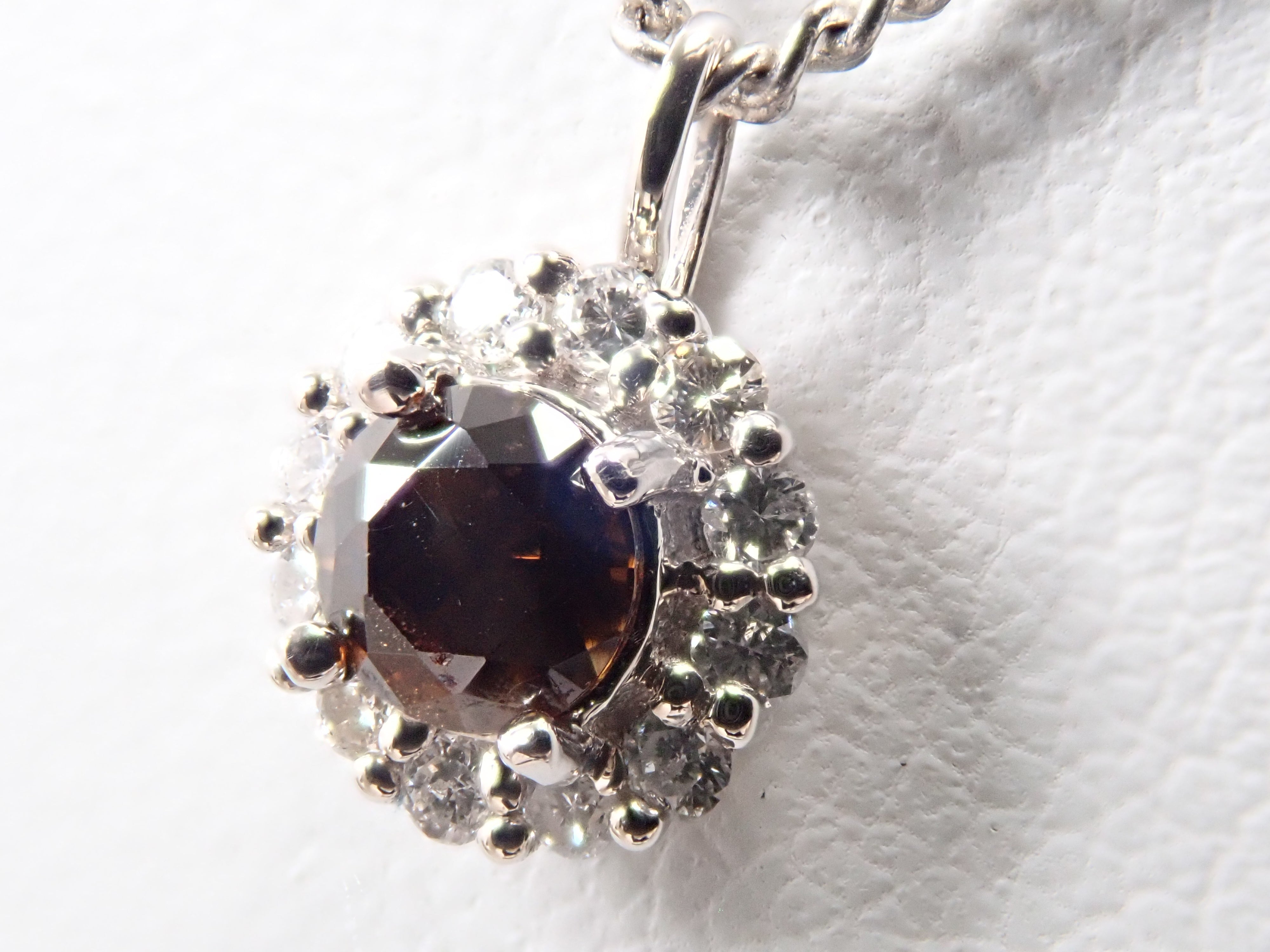 【抽選販売0812_03】Pt900 中国・雲南省産キャシテライト 4mm/0.57ct ・ダイヤモンド0.16ctペンダントトップ(ネックレストップ)鑑別書
