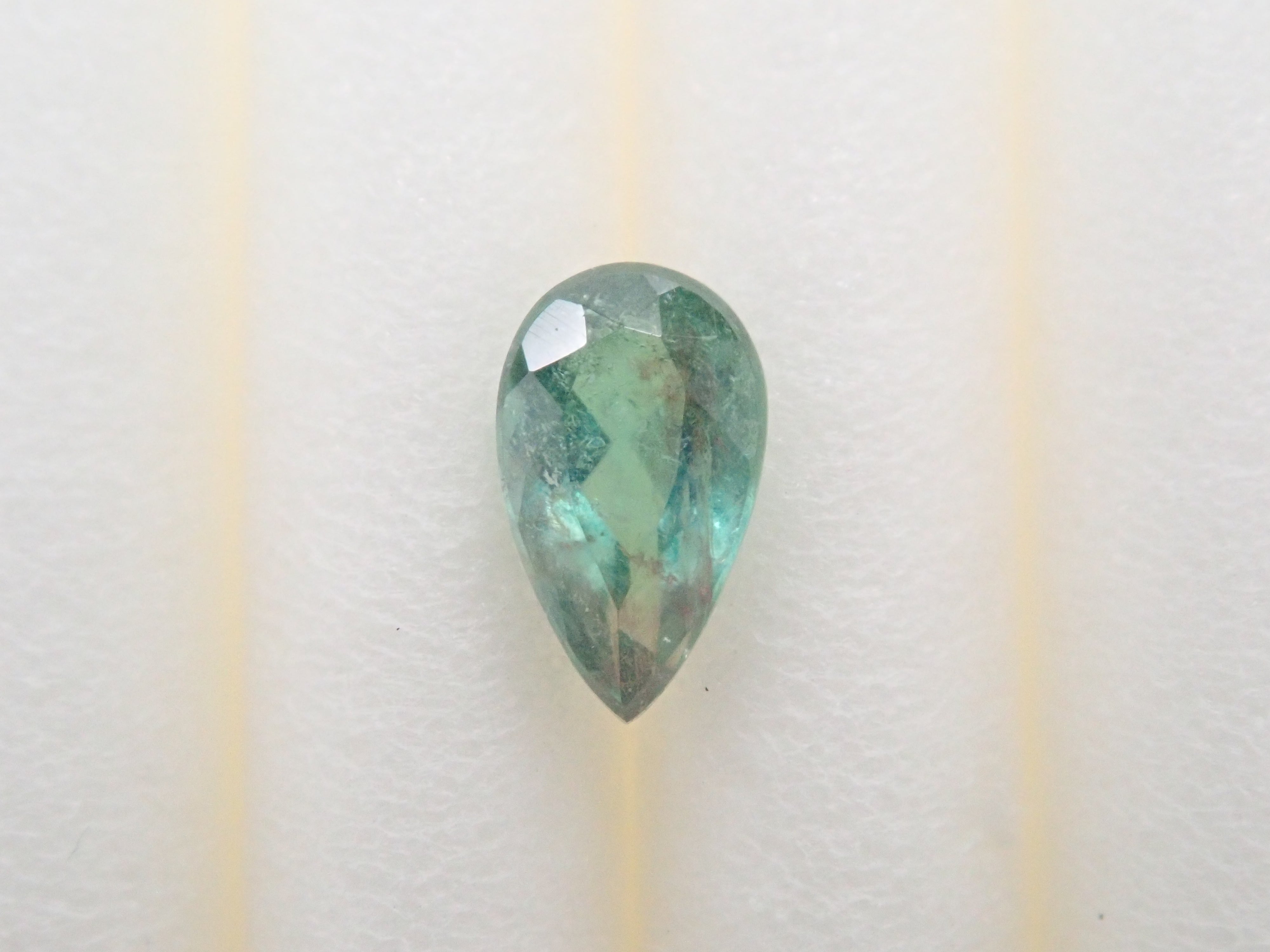 ブラジル産パーティカラーパライバトルマリン 0.149ctルース(CuO:1.4%、MnO:2.8%)