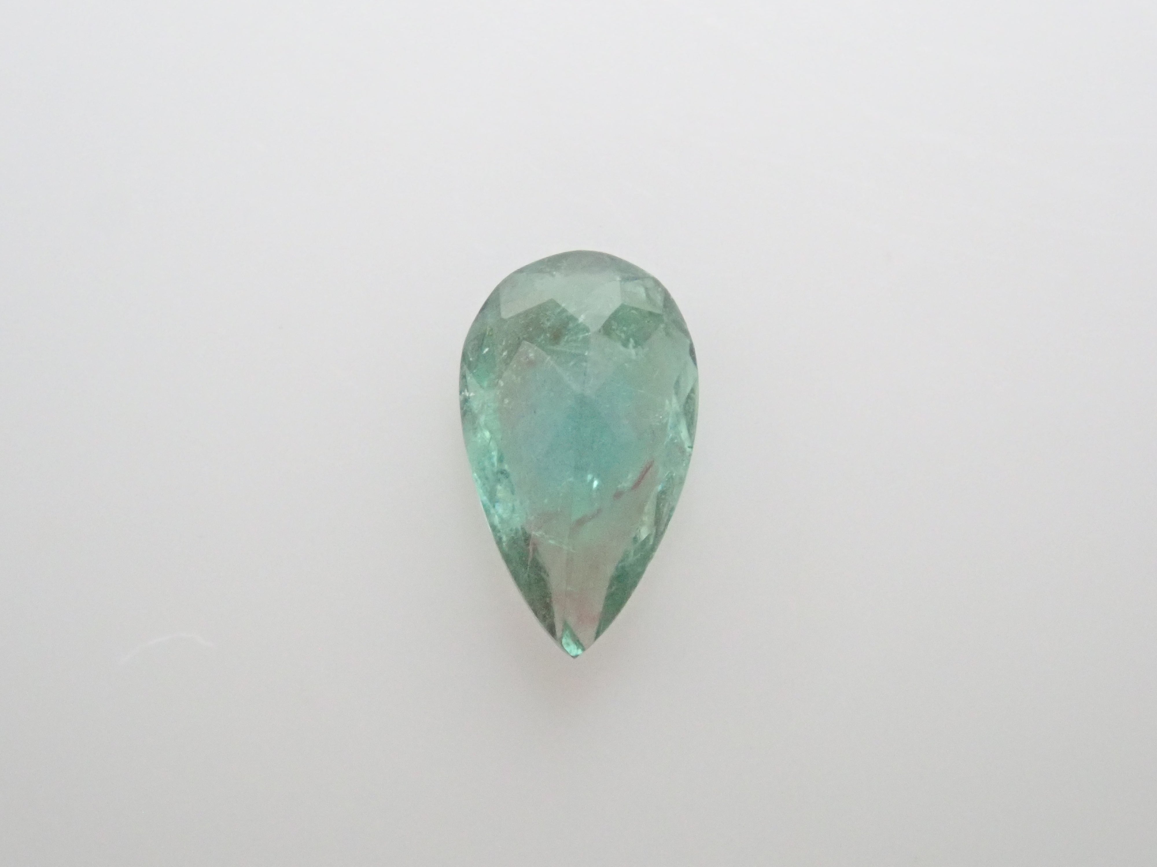 ブラジル産パーティカラーパライバトルマリン 0.149ctルース(CuO:1.4%、MnO:2.8%)