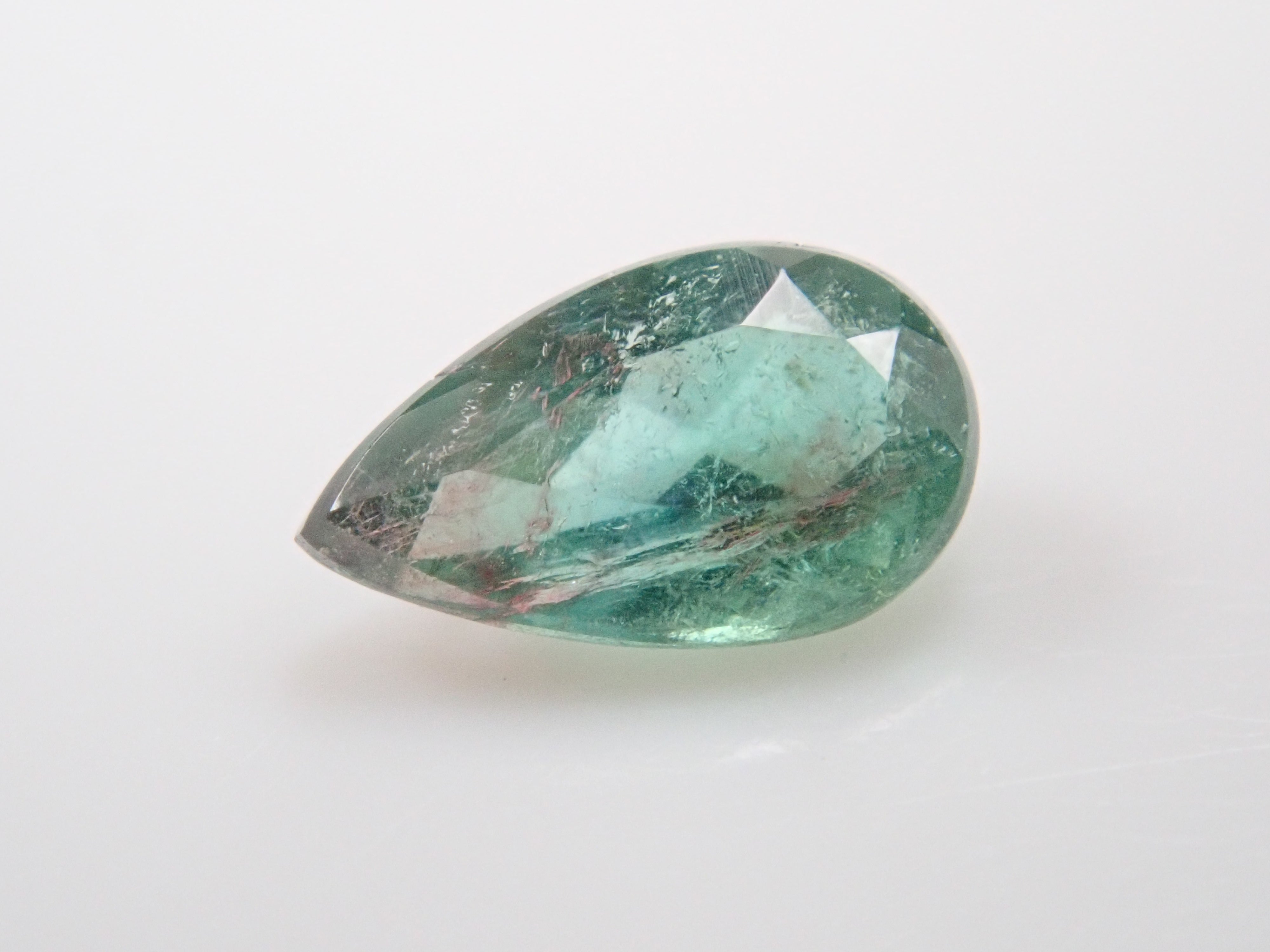 ブラジル産パーティカラーパライバトルマリン 0.149ctルース(CuO:1.4%、MnO:2.8%)