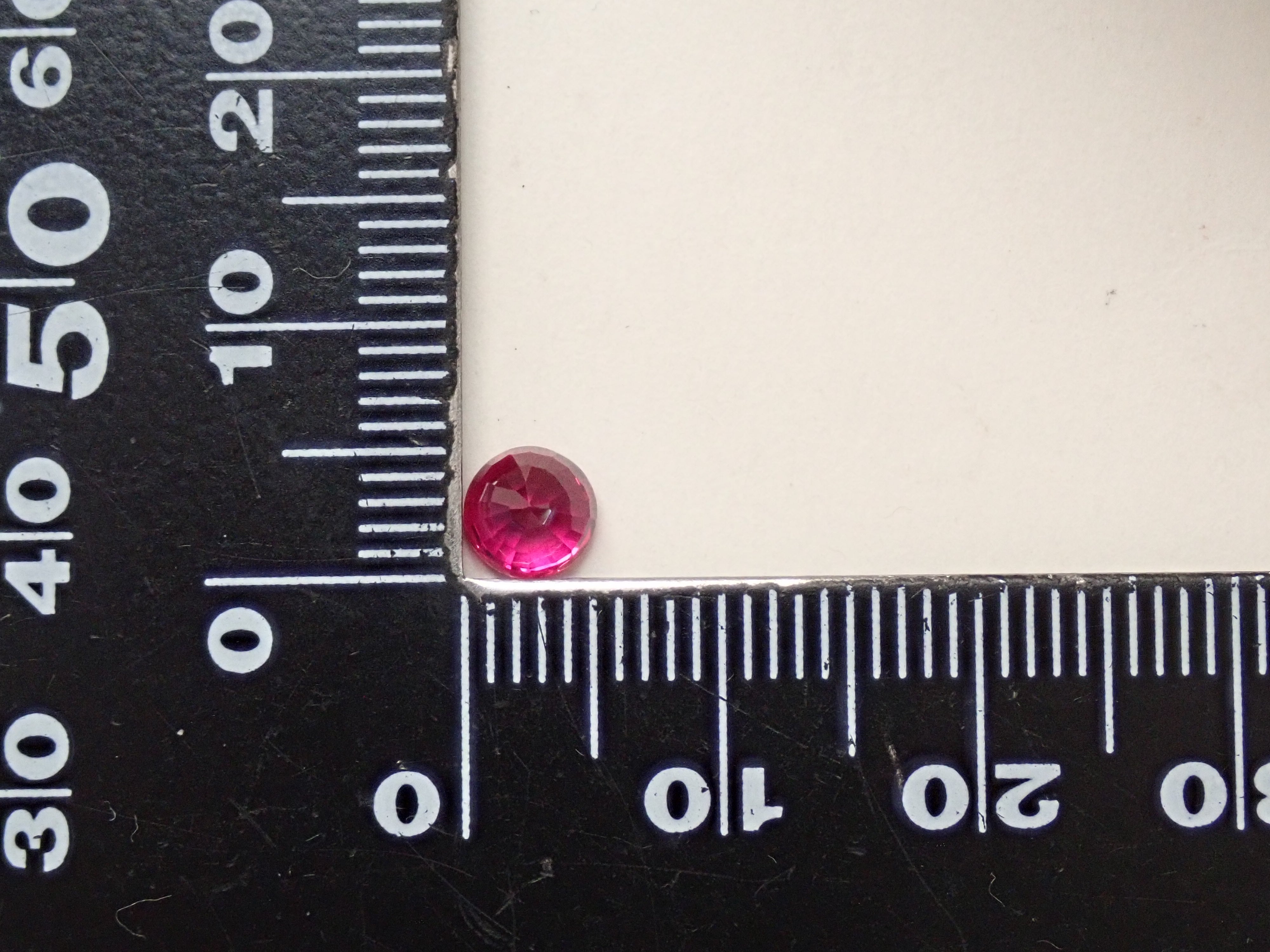 ピジョンブラッドルビー 5.2mm/0.930ctルース AIGS