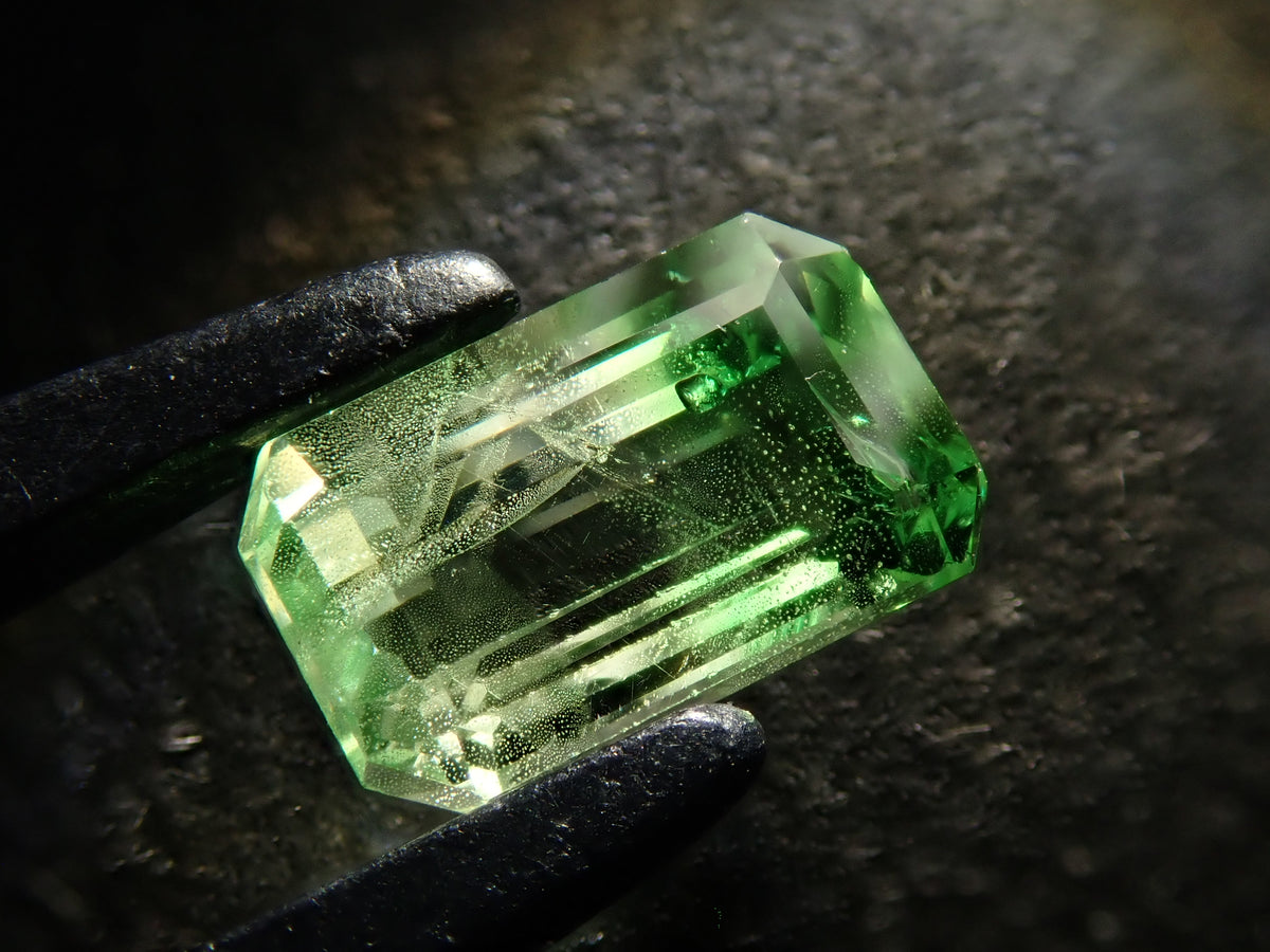 【12563641掲載】タンザニア産バイカラーグロッシュラーガーネット 0.869ctルース