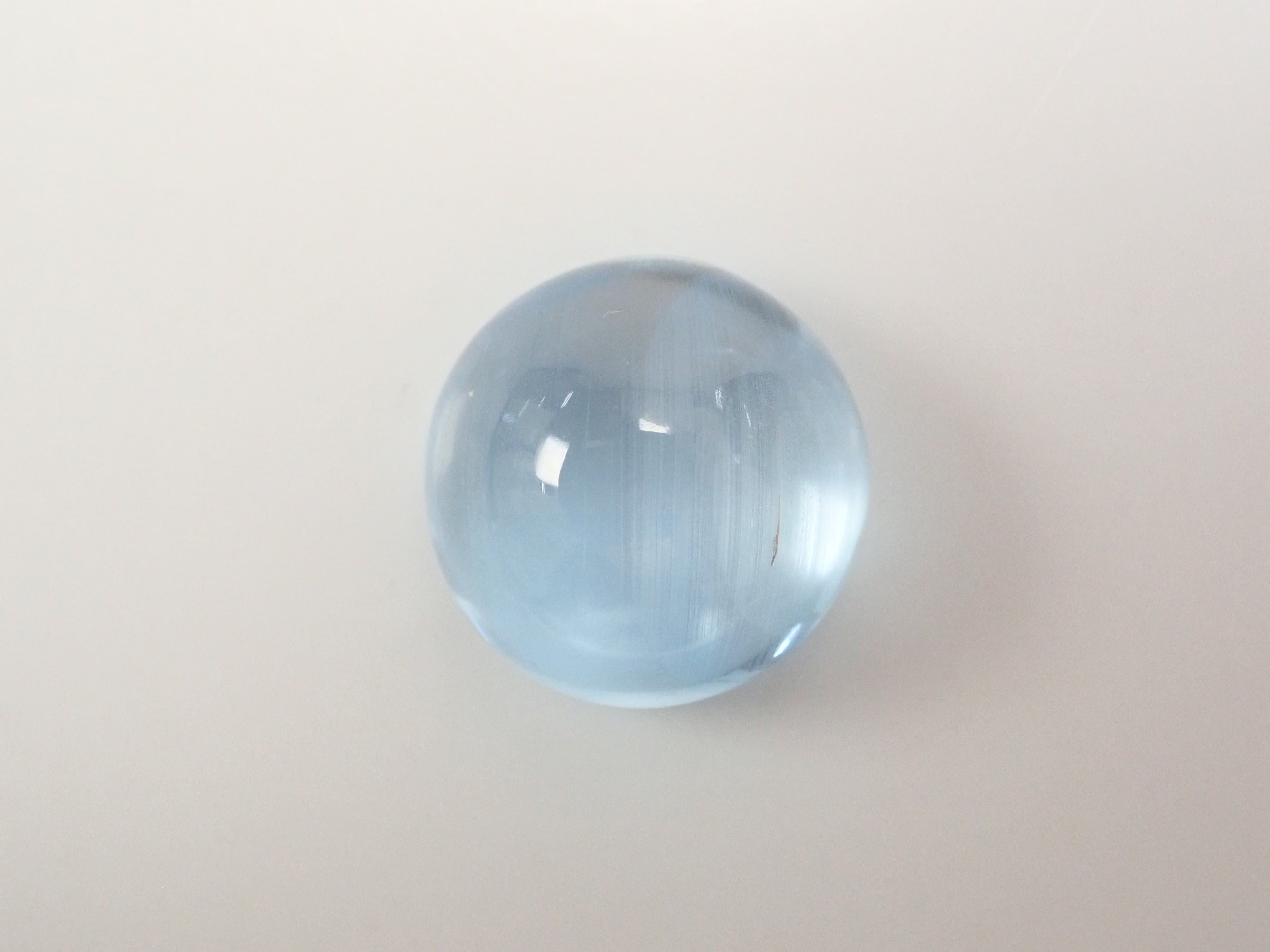 【12560374掲載】ブルートパーズキャッツアイ 22.761ctルース