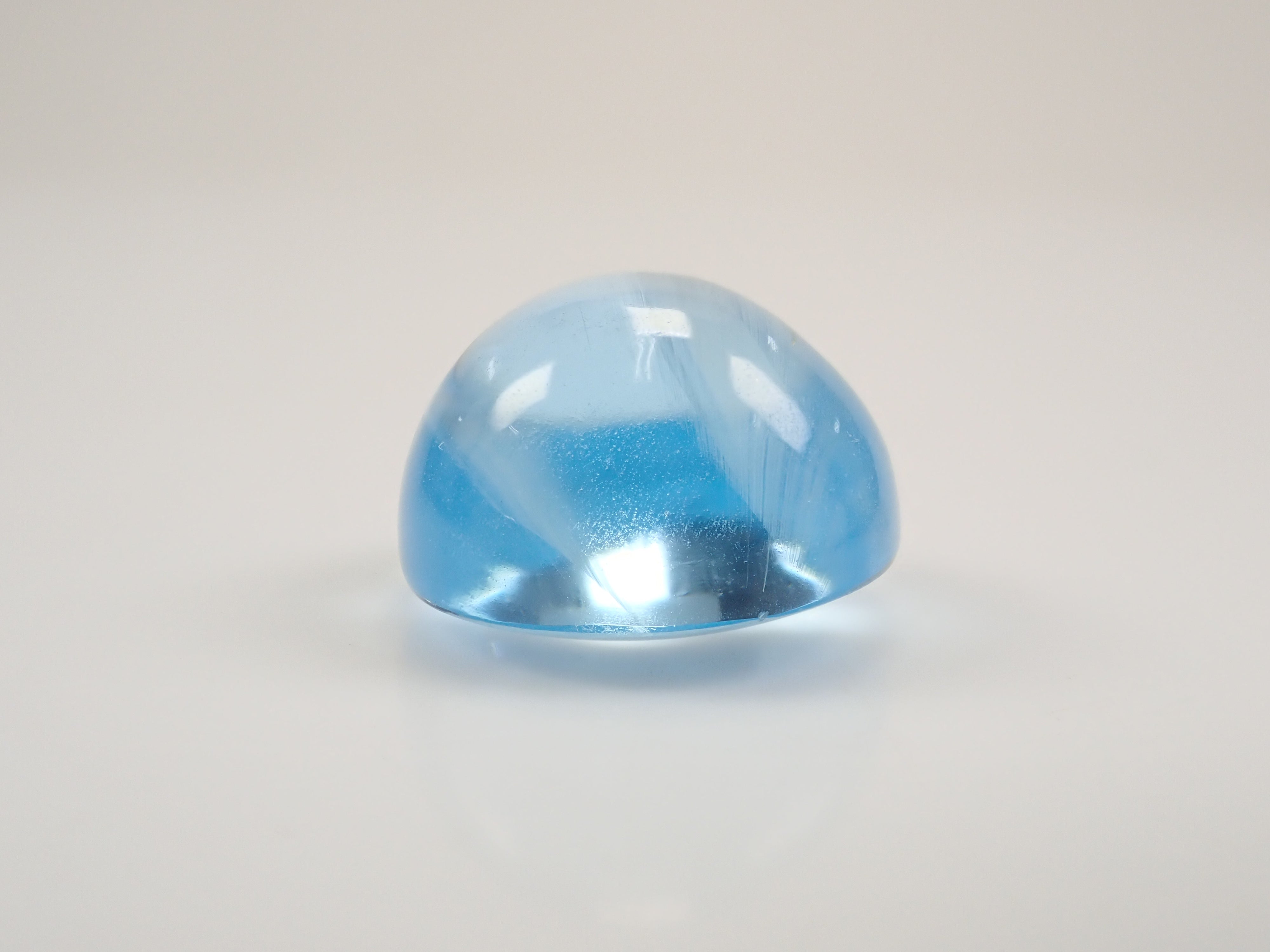 【12560374掲載】ブルートパーズキャッツアイ 22.761ctルース