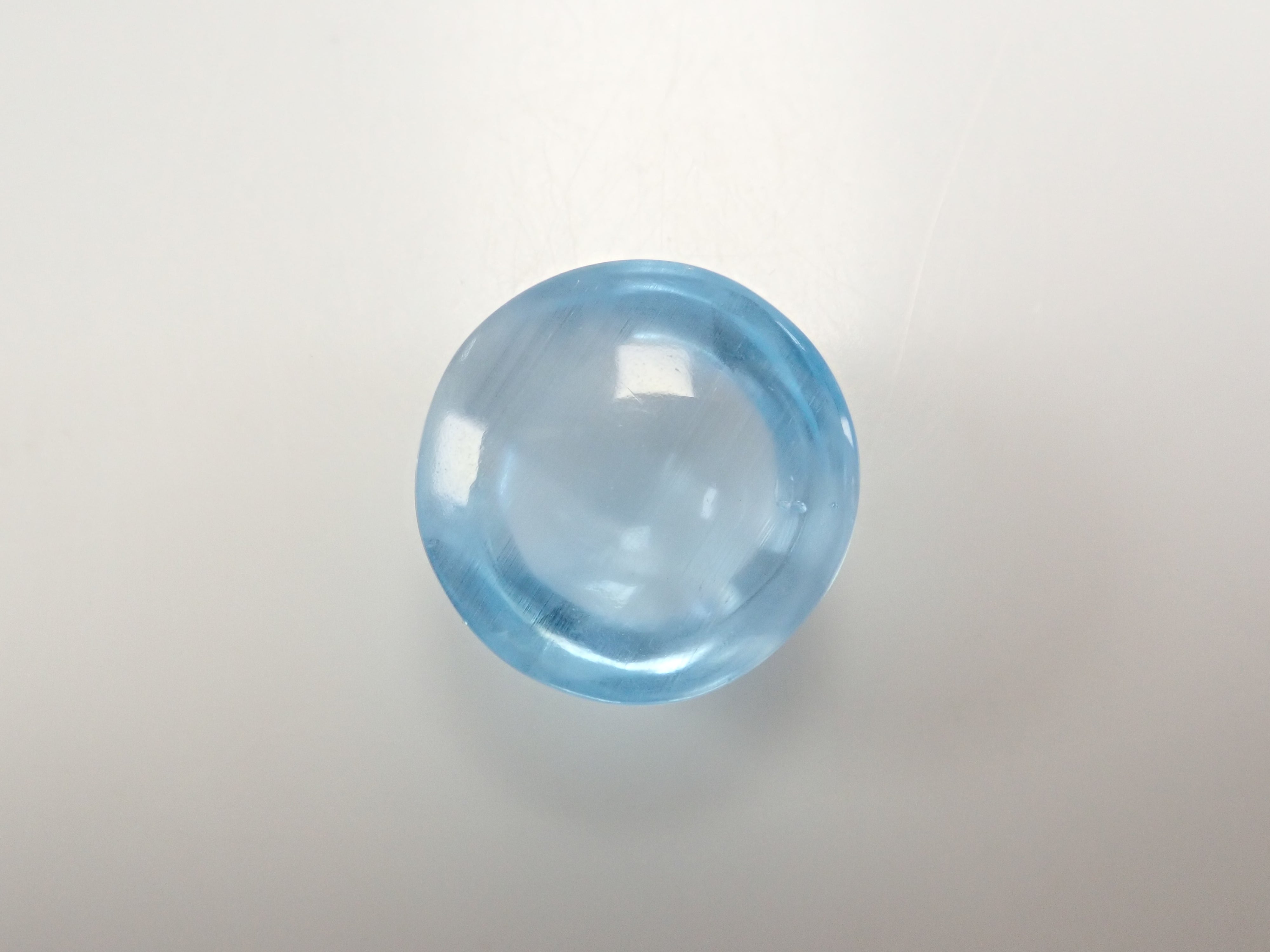 【12560374掲載】ブルートパーズキャッツアイ 22.761ctルース