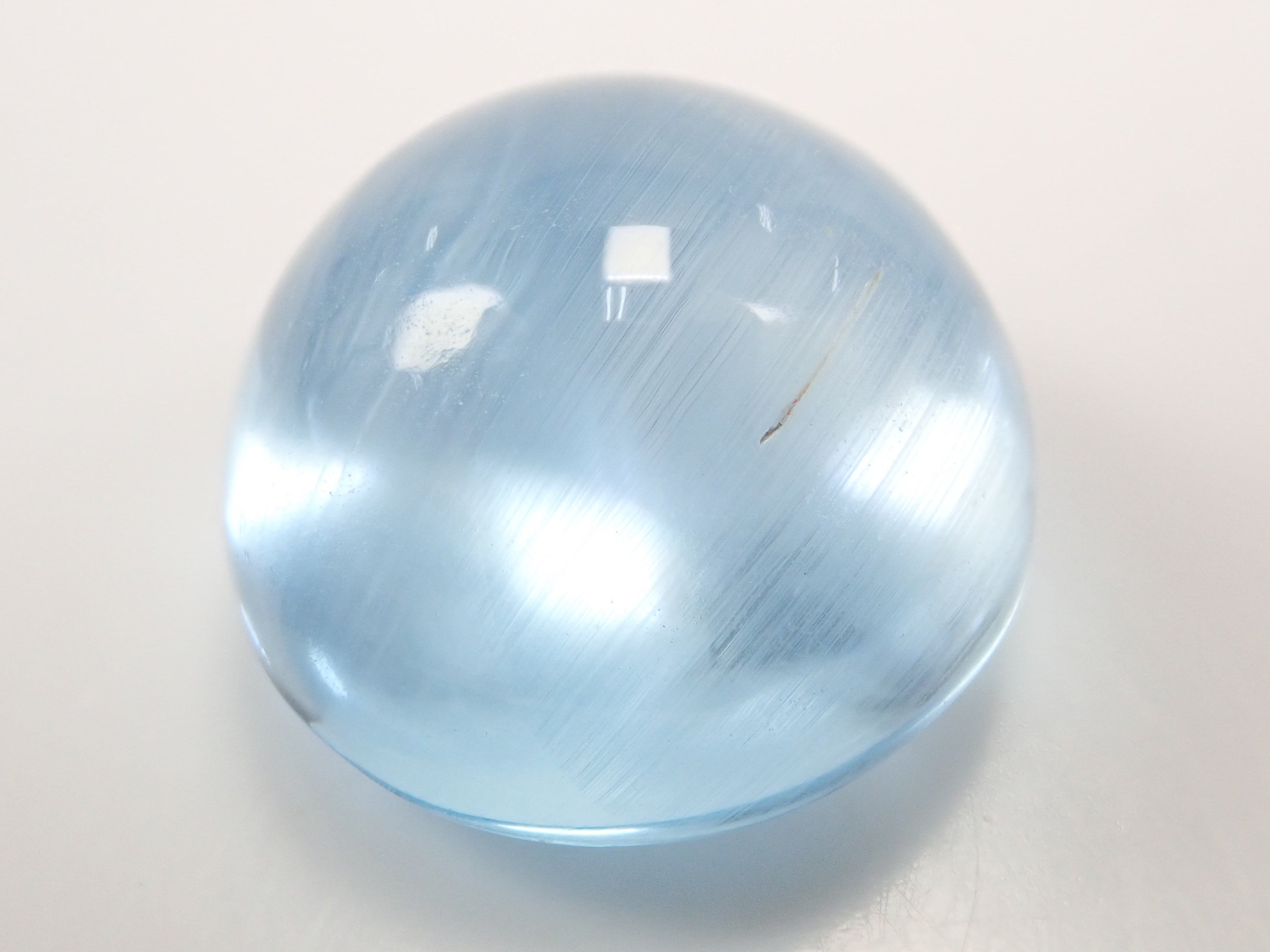 【12560374掲載】ブルートパーズキャッツアイ 22.761ctルース