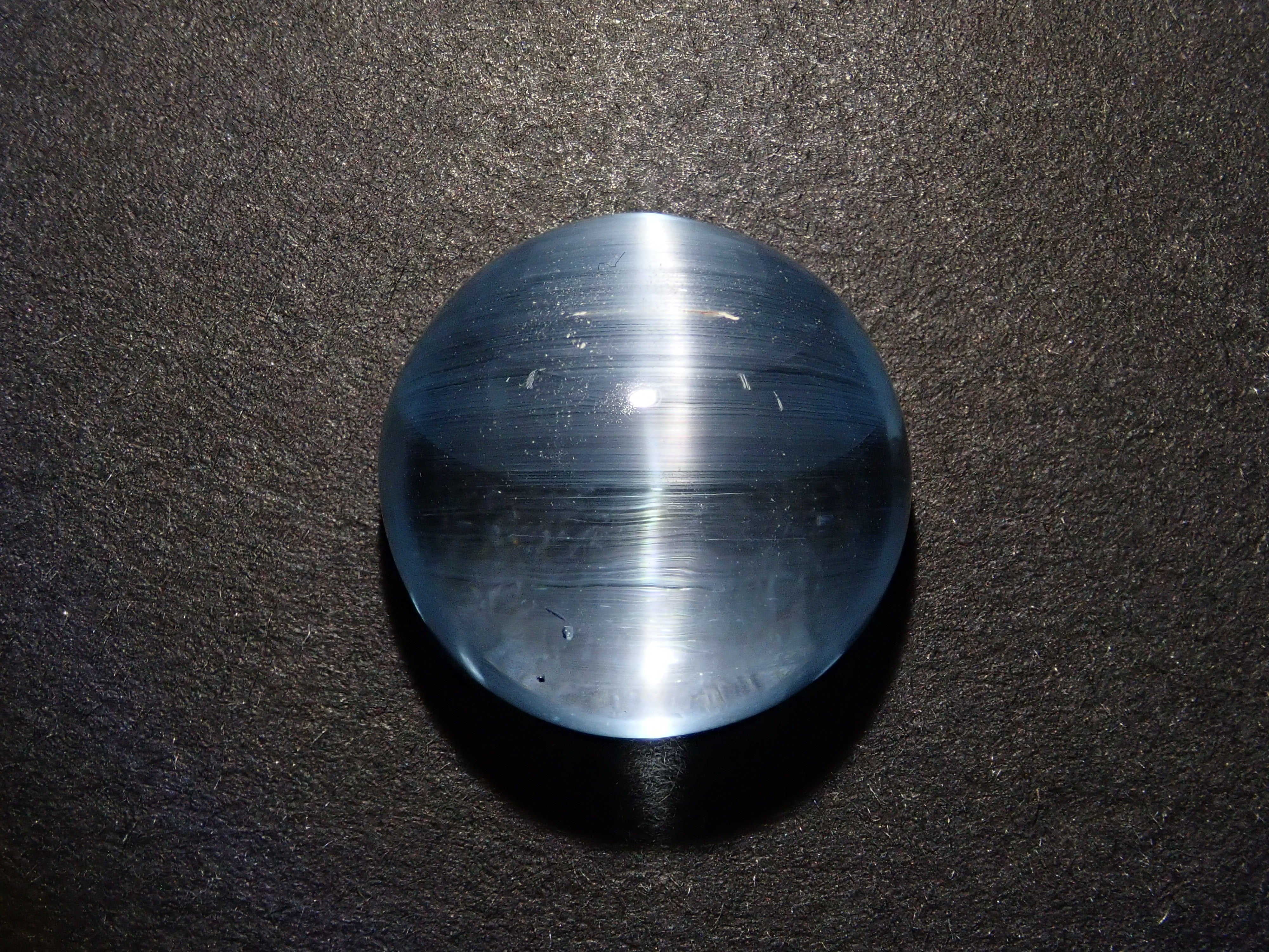 【12560374掲載】ブルートパーズキャッツアイ 22.761ctルース