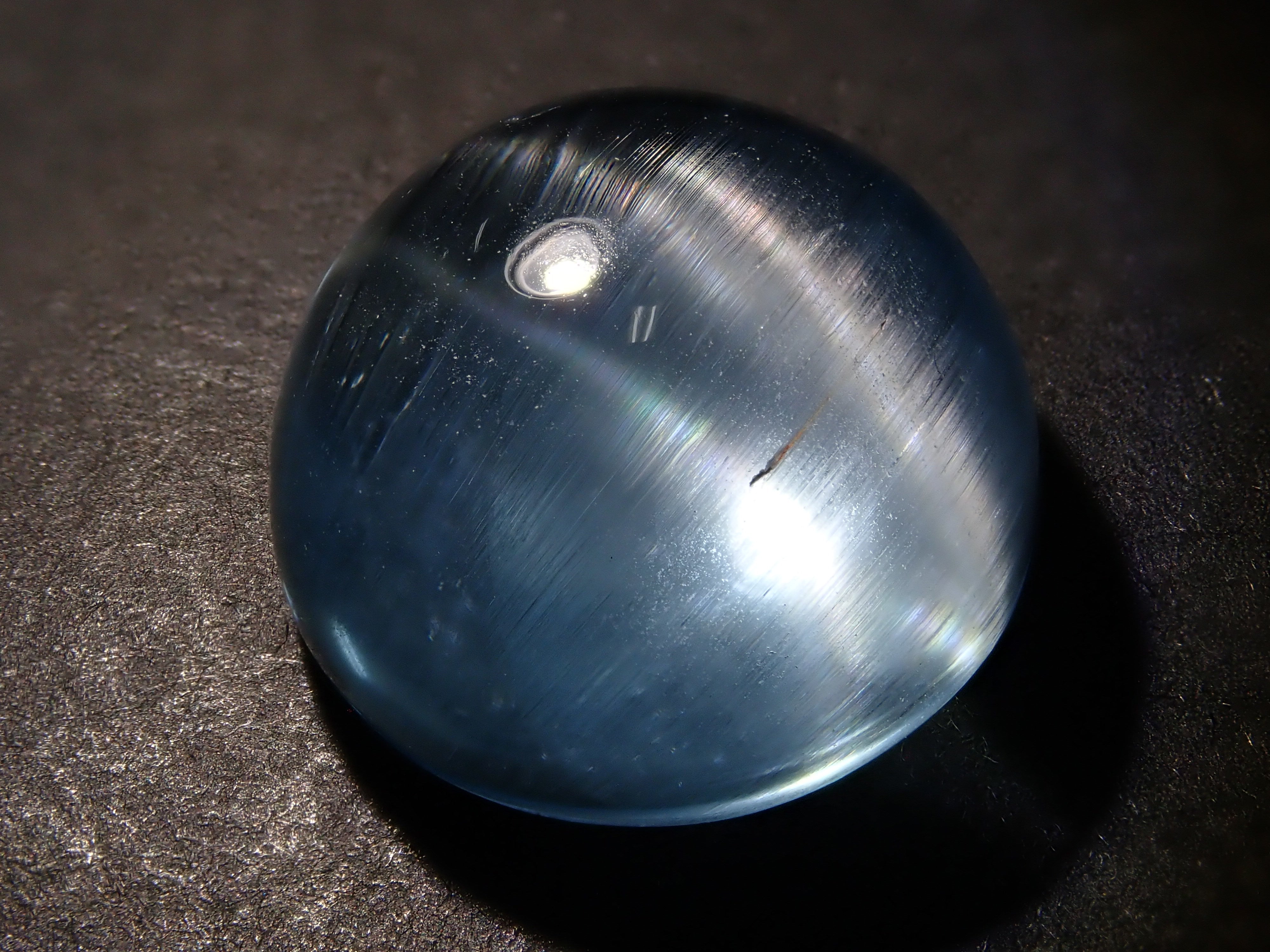 【12560374掲載】ブルートパーズキャッツアイ 22.761ctルース