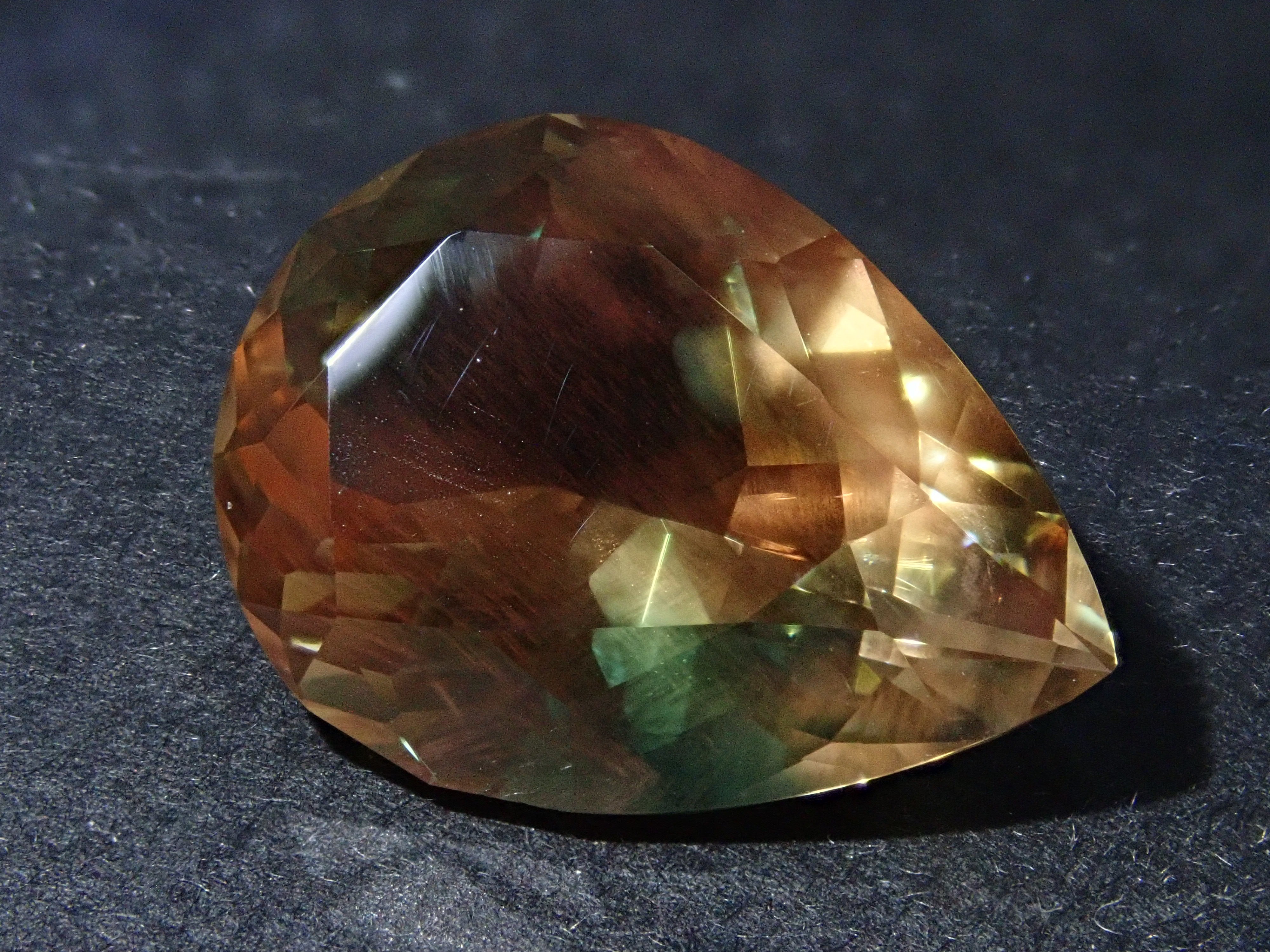 【12560346掲載】アメリカ産オレゴンサンストーン 8.338ctルース