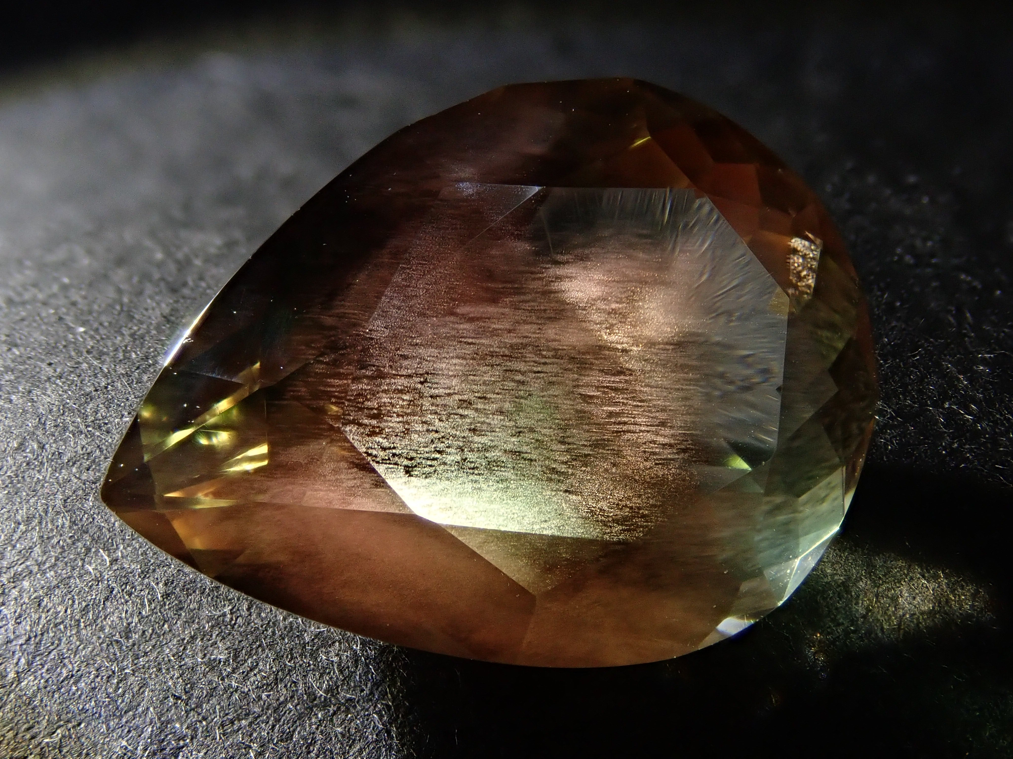 【12560346掲載】アメリカ産オレゴンサンストーン 8.338ctルース