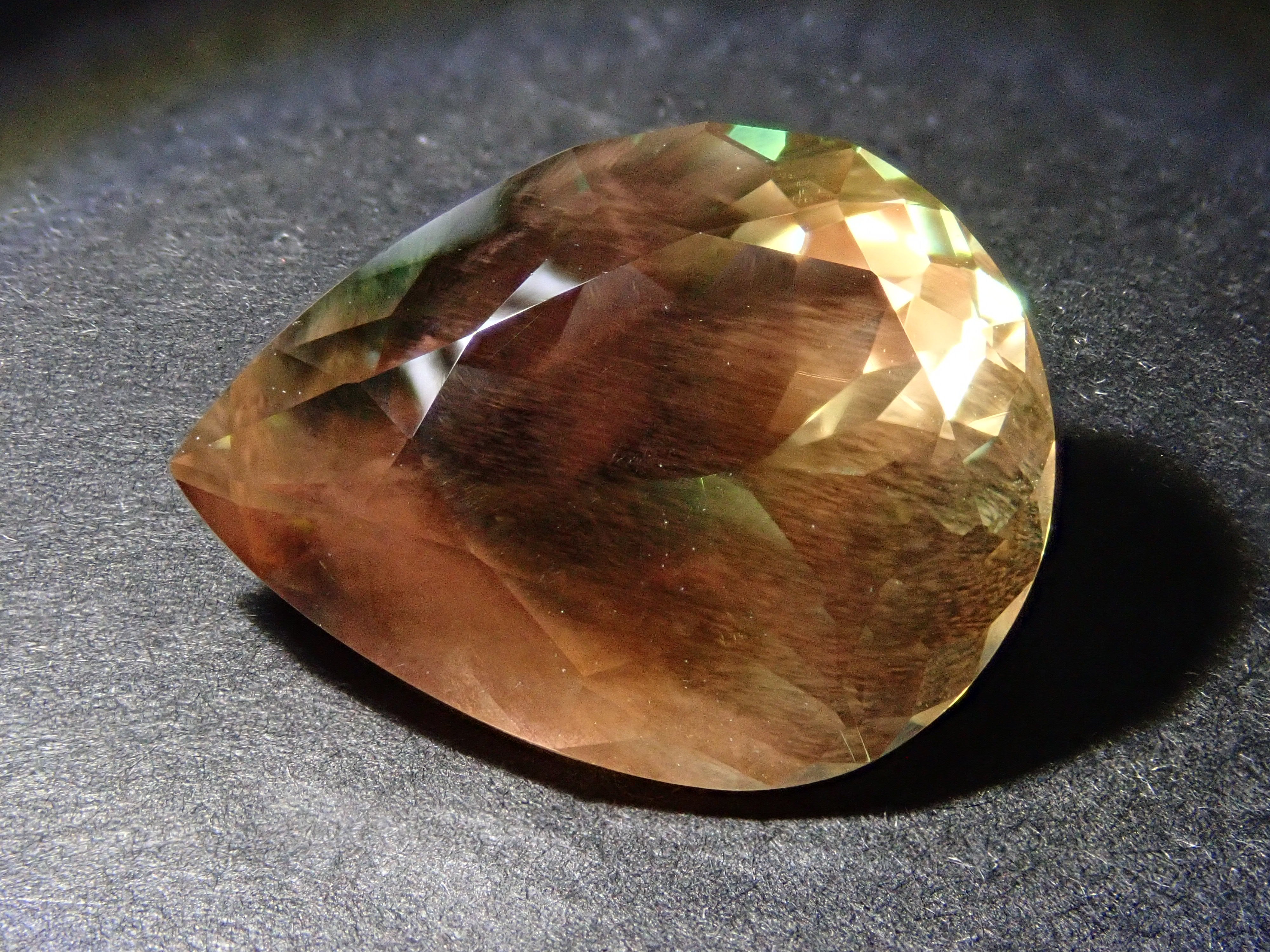 【12560346掲載】アメリカ産オレゴンサンストーン 8.338ctルース