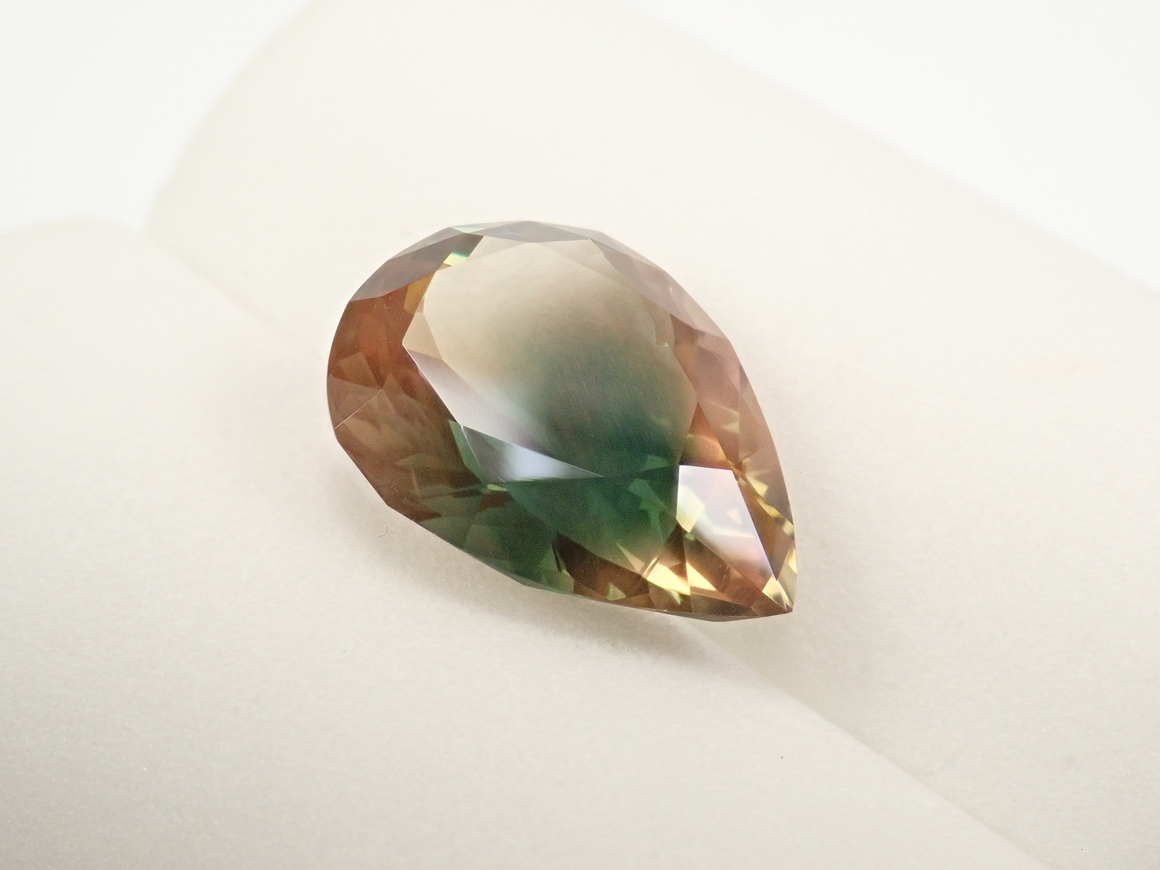 【12560346掲載】アメリカ産オレゴンサンストーン 8.338ctルース