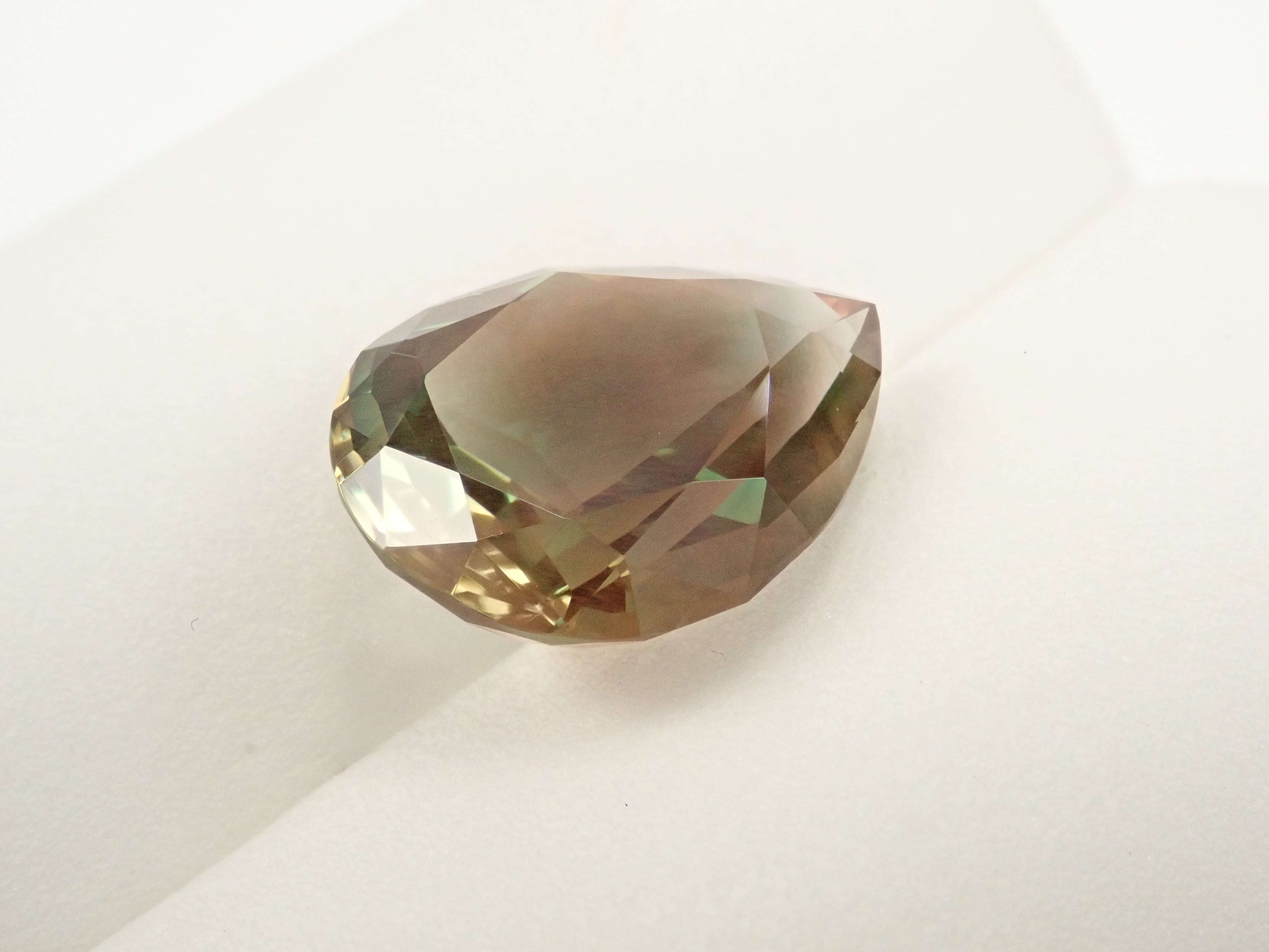 【12560346掲載】アメリカ産オレゴンサンストーン 8.338ctルース