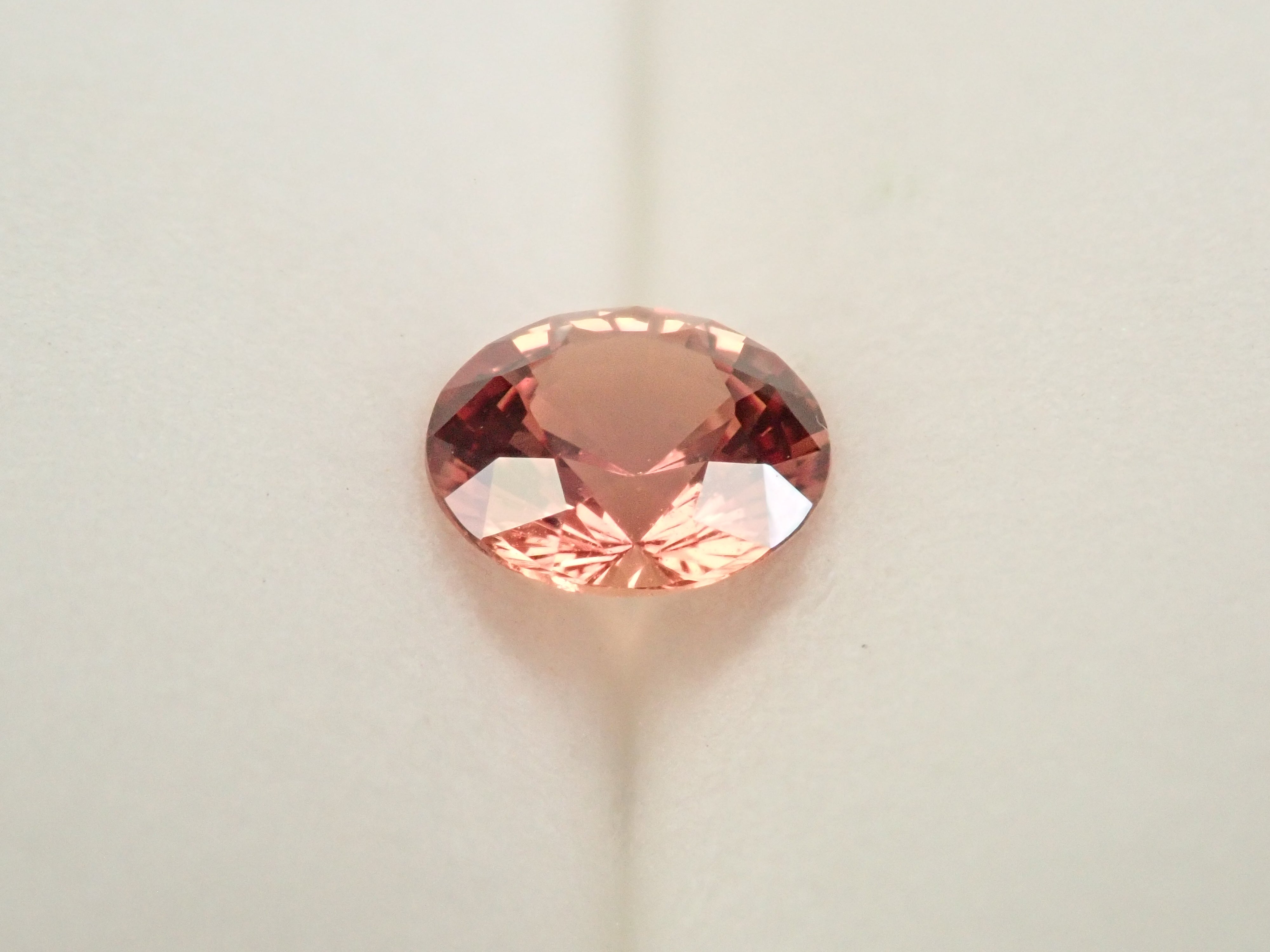 【抽選販売:10/31(金)10時am〆】マダガスカル産パパラチアサファイア 5.6mm/0.768ctルース 中央宝石研究所