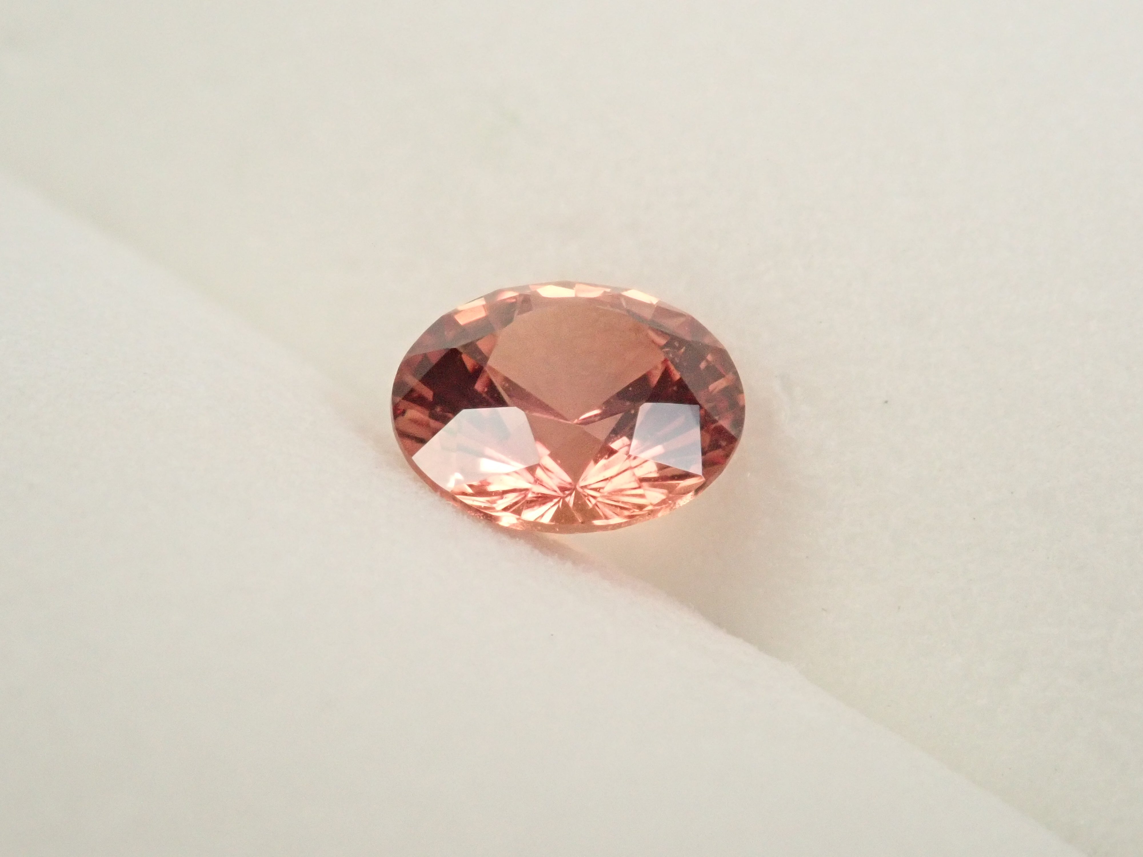 【抽選販売:10/31(金)10時am〆】マダガスカル産パパラチアサファイア 5.6mm/0.768ctルース 中央宝石研究所