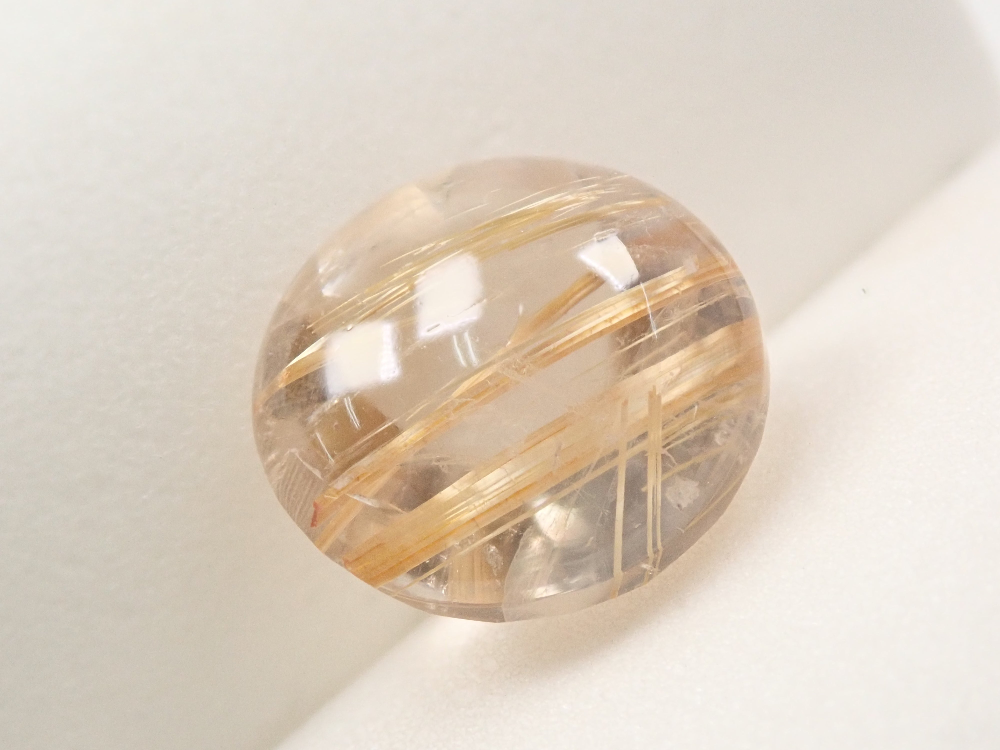 ブラジル産ルチルクォーツ(ルチルレイテッドクォーツ) 12mm/6.709ctルース