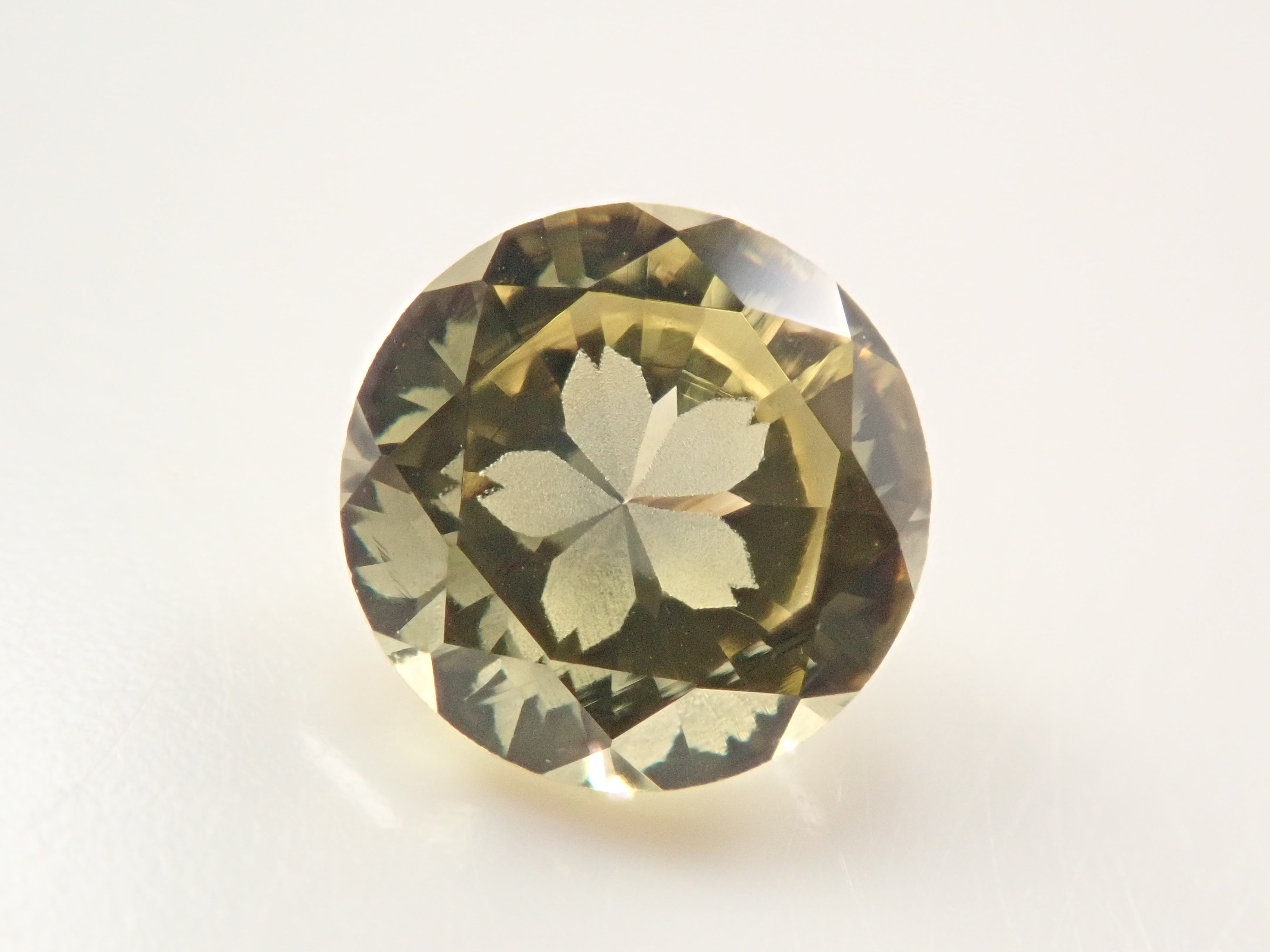 【さくらインカット】マリ共和国産マリガーネット(グロッシュラー/アンドラダイト・ガーネット) 6.0mm/0.920ctルース 鑑別書