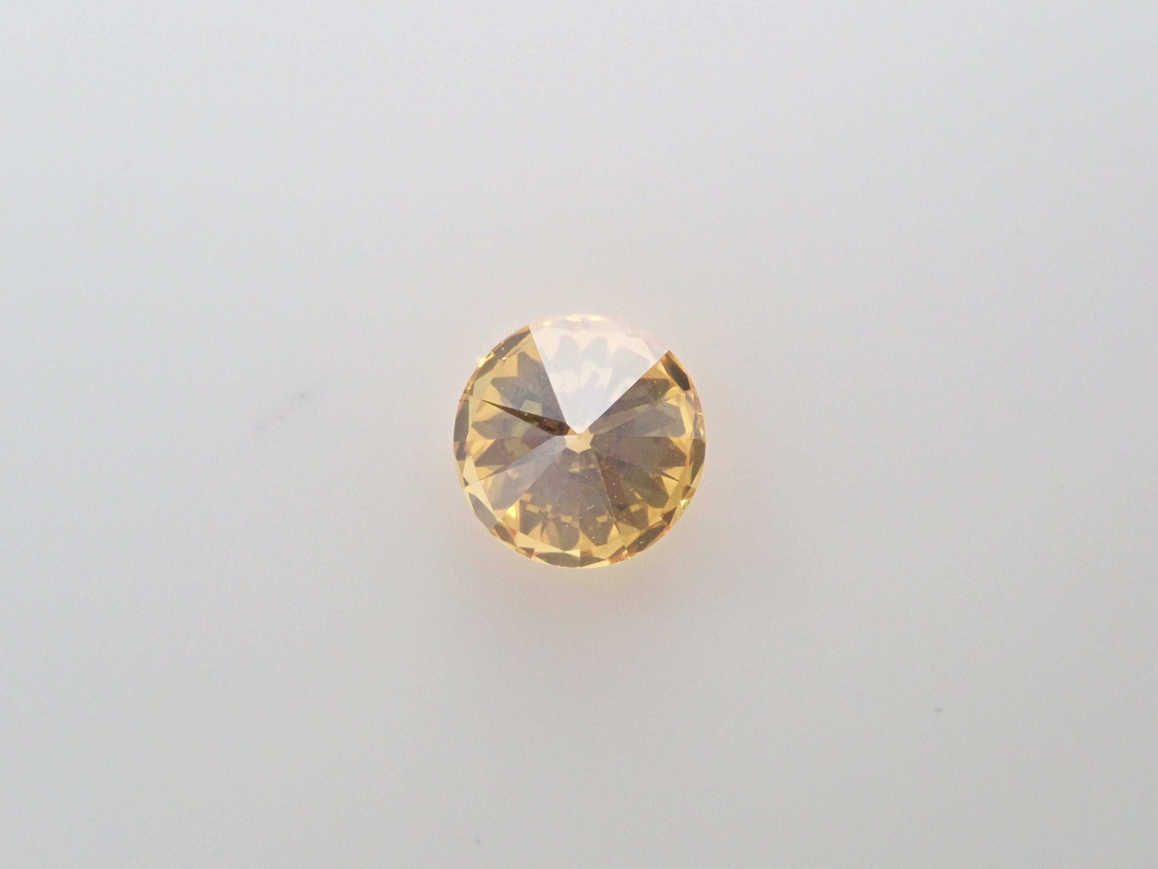 イエローダイヤモンド 0.165ctルース(FANCY VIVID ORANGY YELLOW, SI-2)