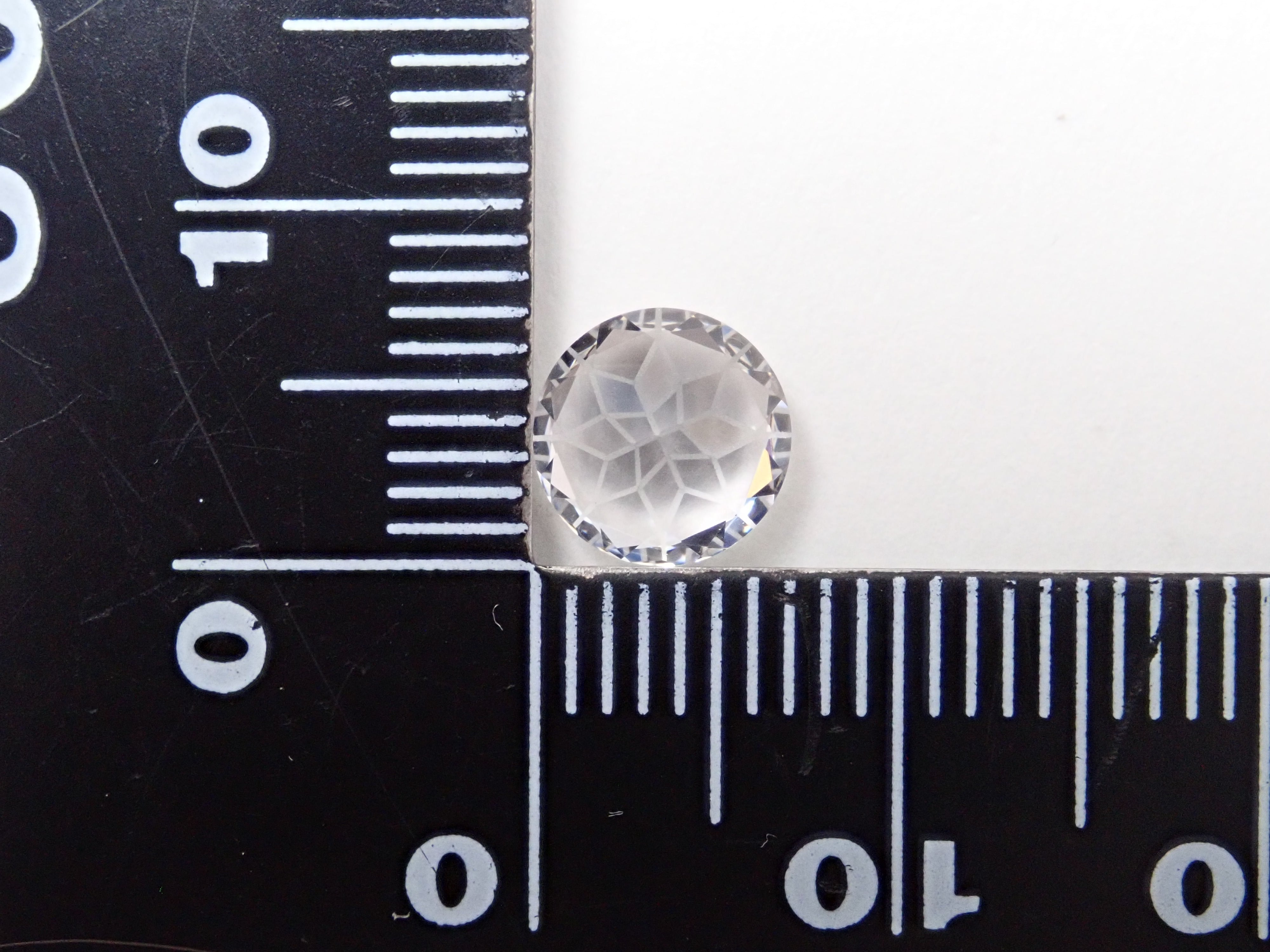 【ダンデライオンカット】ダンビュライト 7mm/1.364ctルース ワッペン付