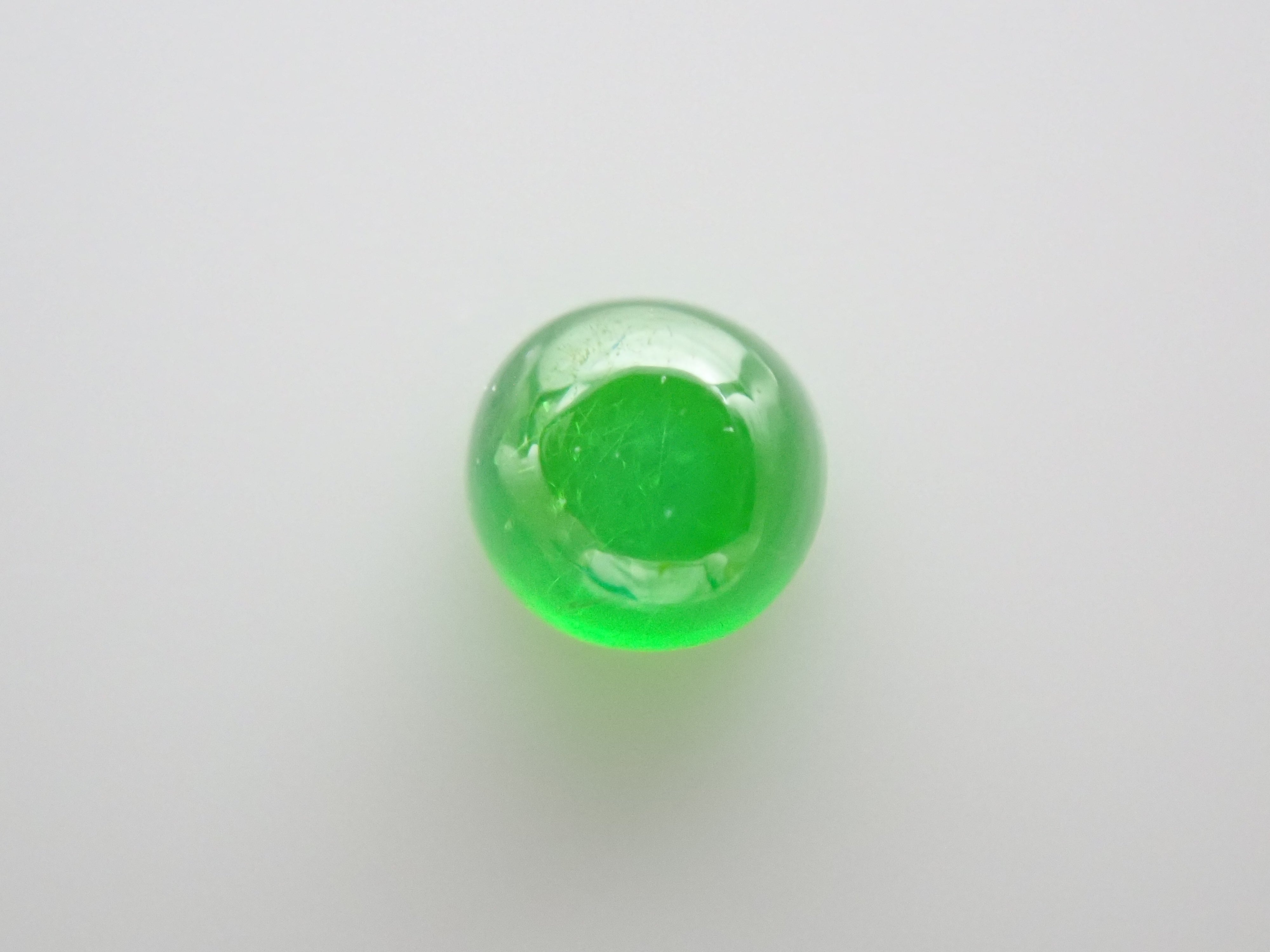 ロシア産デマントイドガーネット(ホーステール認む)2mm/0.053ctルース