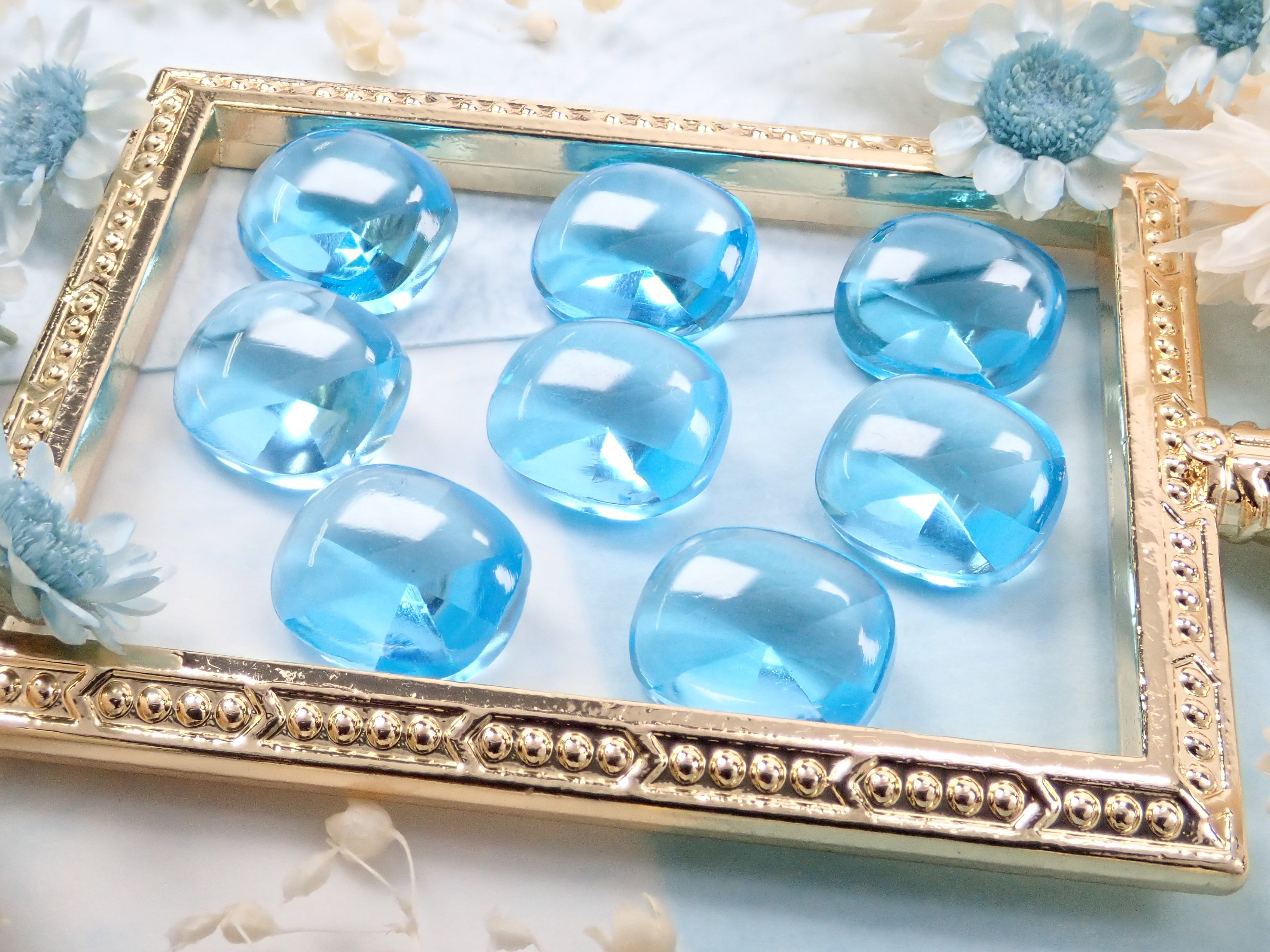 スイスブルートパーズ1石(9.5×8mm,特殊カット)《複数購入割引有》