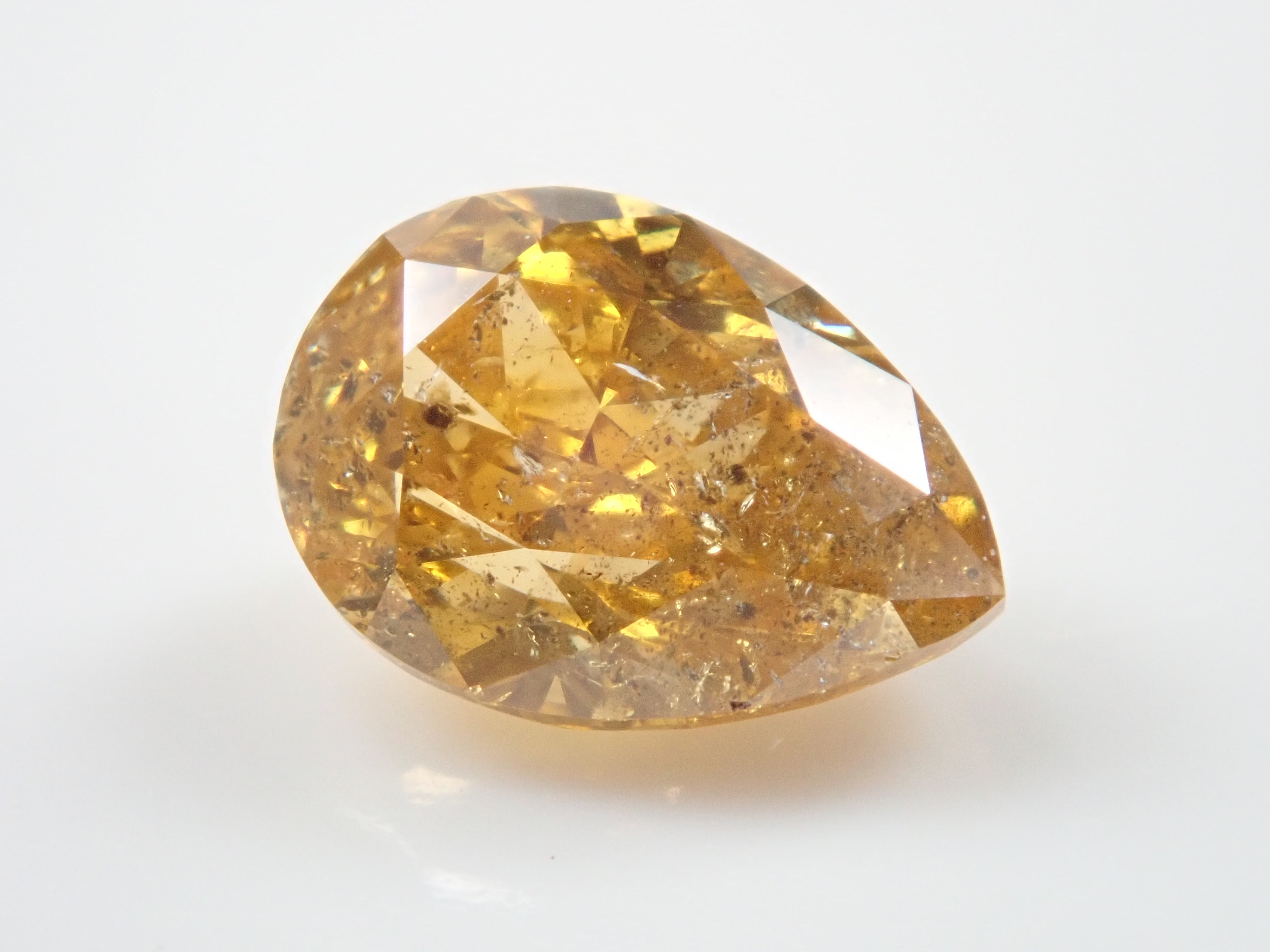 イエローダイヤモンド 0.706ctルース(FANCY DEEP ORANGY YELLOW, I-1)