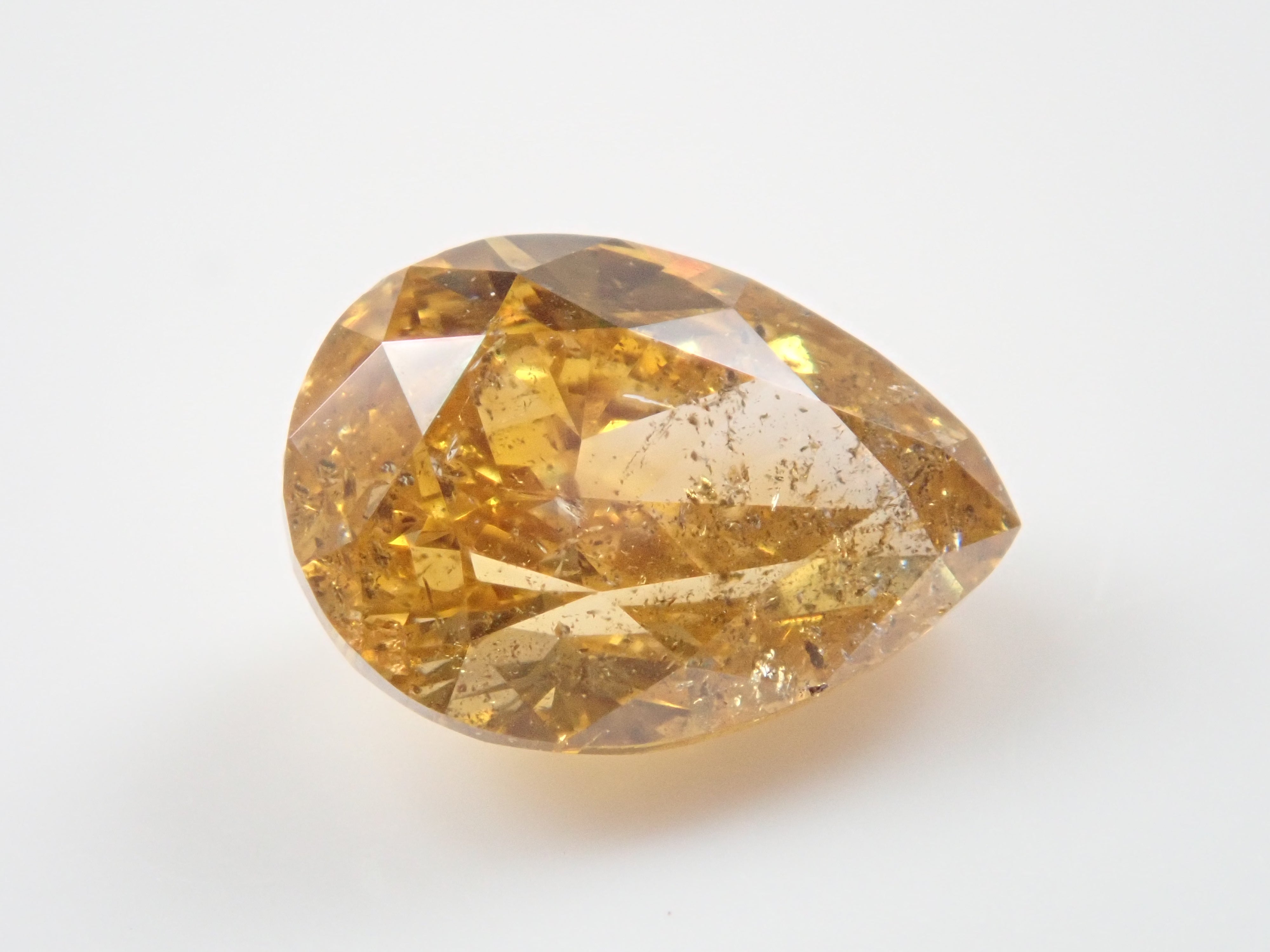 イエローダイヤモンド 0.706ctルース(FANCY DEEP ORANGY YELLOW, I-1)