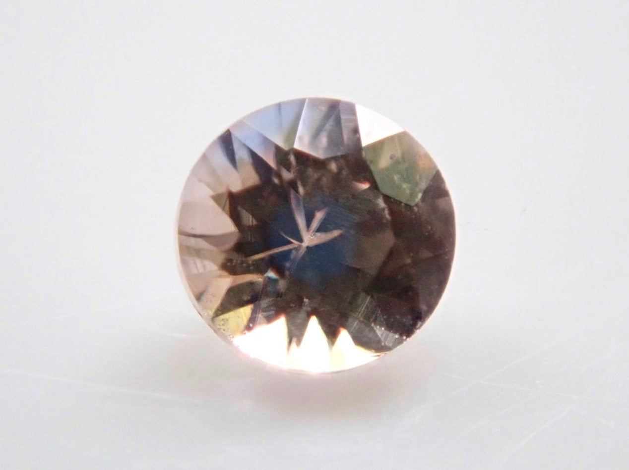 桃色藍錐石 2.4 mm/0.076 克拉散裝日德版(橘色/藍色)