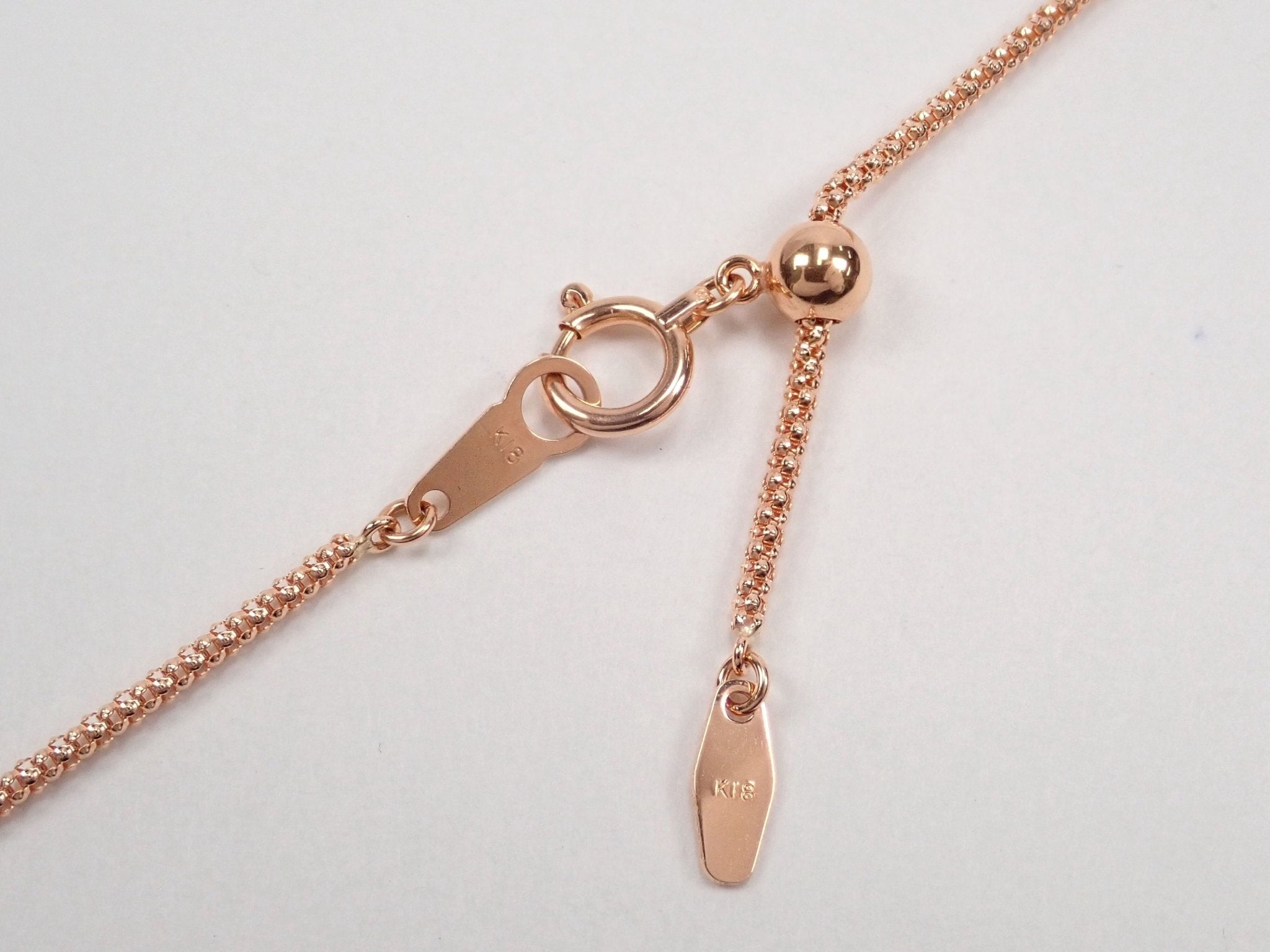 K18PGローズクォーツ15.964ct ペンダント(甲州貴石切子) - KARATZ STORE|カラッツSTORE