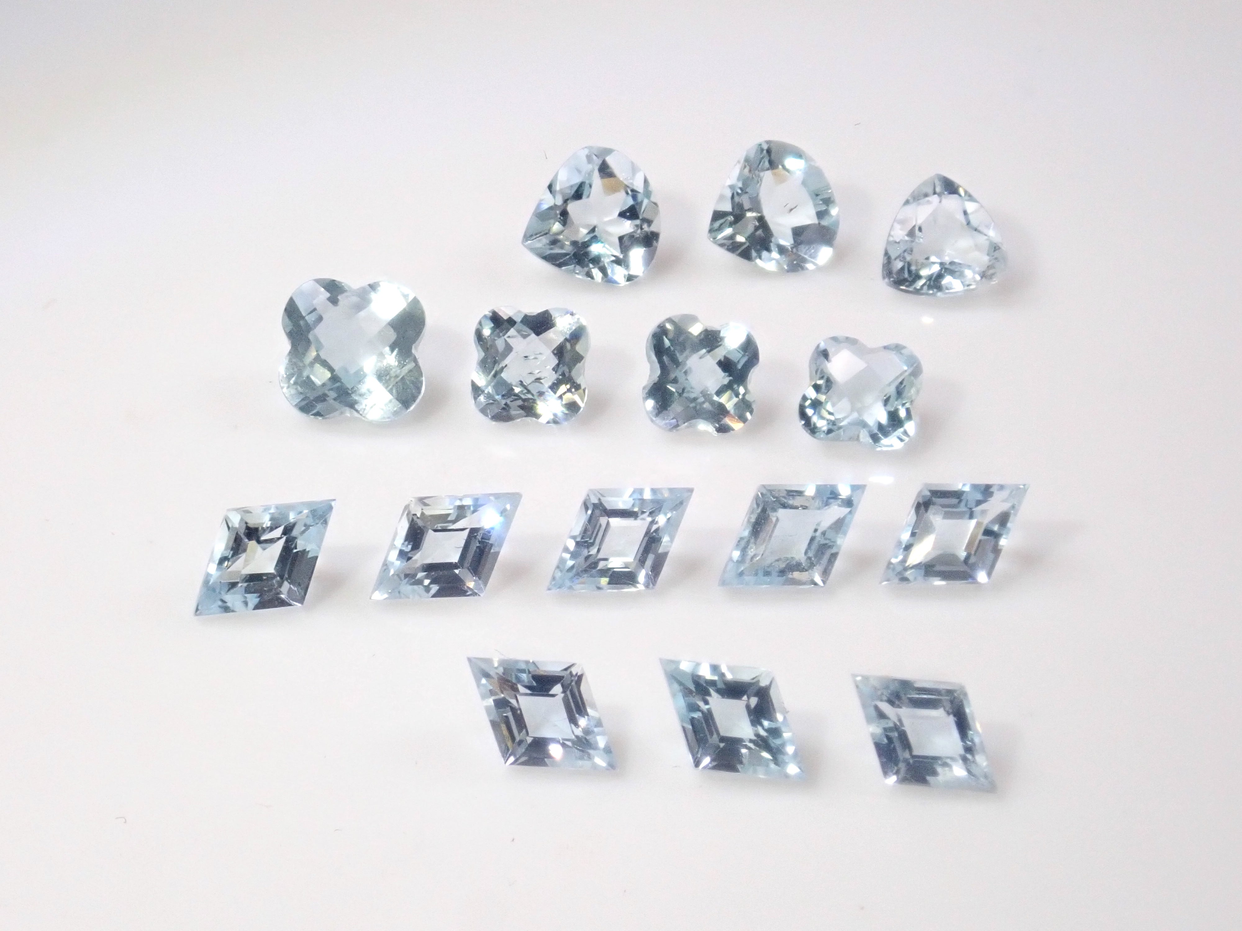 Limited to 15 stones: Mozambique aquamarine rough + 2 loose stones set. Discounts available for multiple purchases.