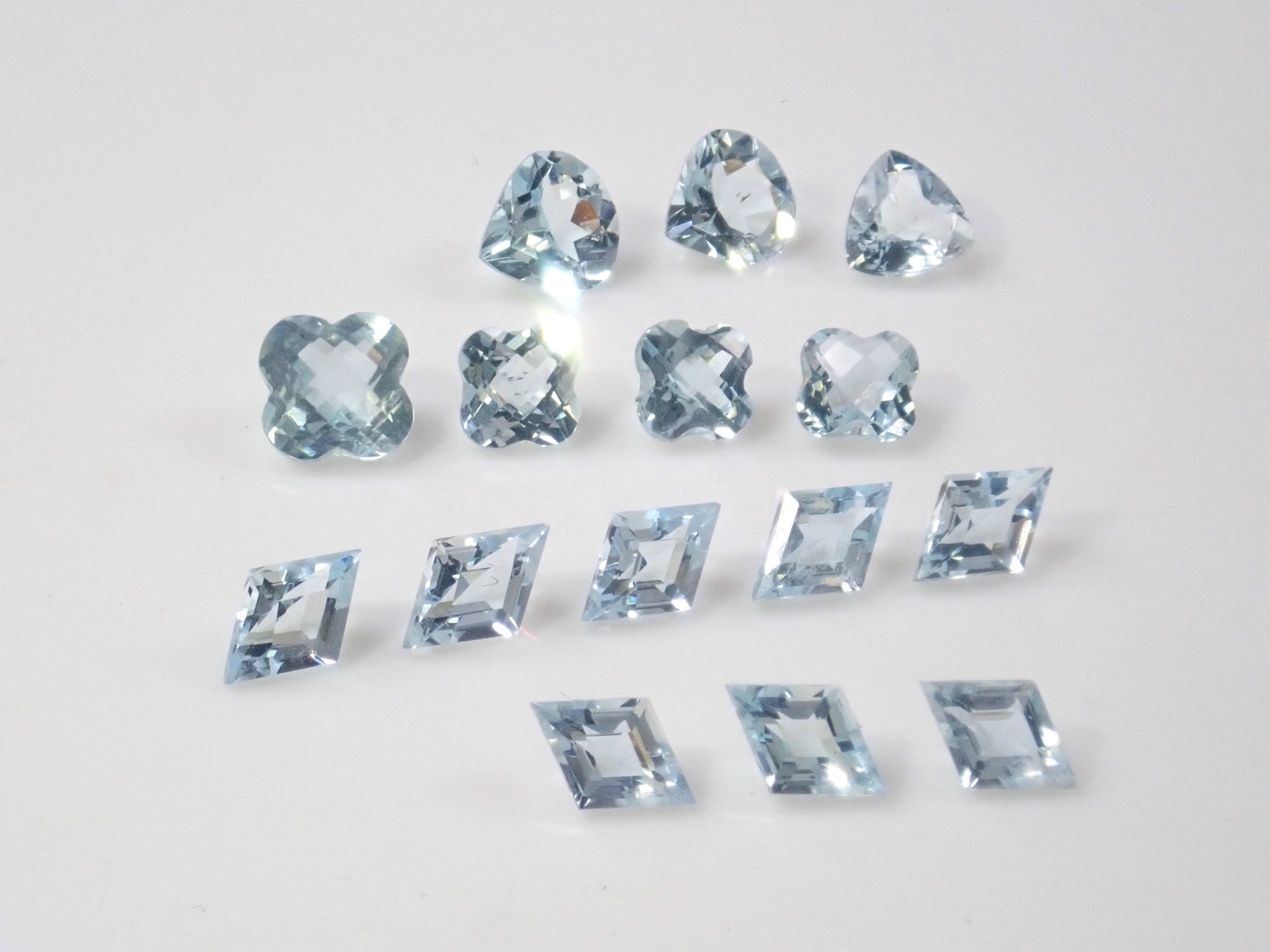 Limited to 15 stones: Mozambique aquamarine rough + 2 loose stones set. Discounts available for multiple purchases.