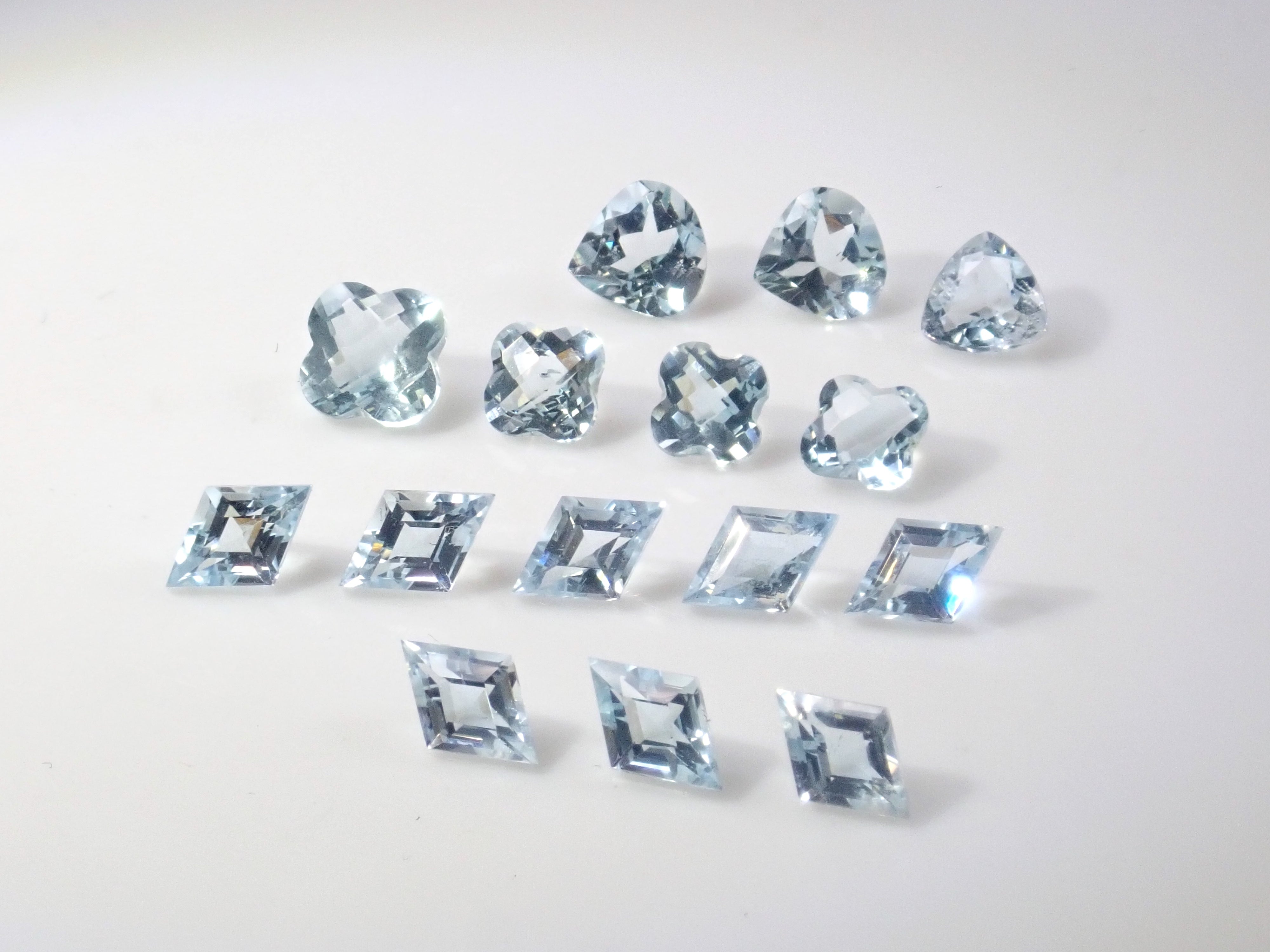 Limited to 15 stones: Mozambique aquamarine rough + 2 loose stones set. Discounts available for multiple purchases.