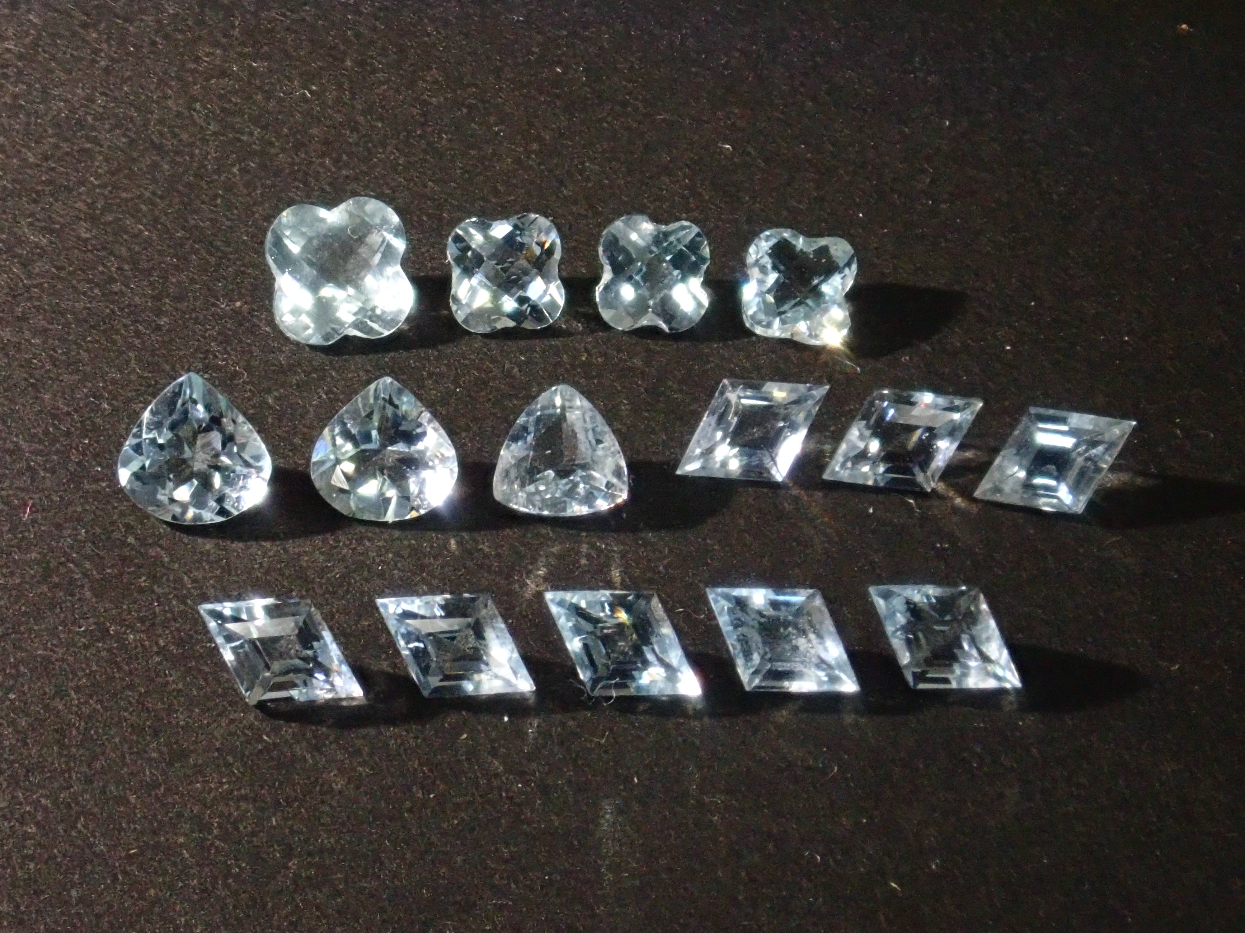 Limited to 15 stones: Mozambique aquamarine rough + 2 loose stones set. Discounts available for multiple purchases.