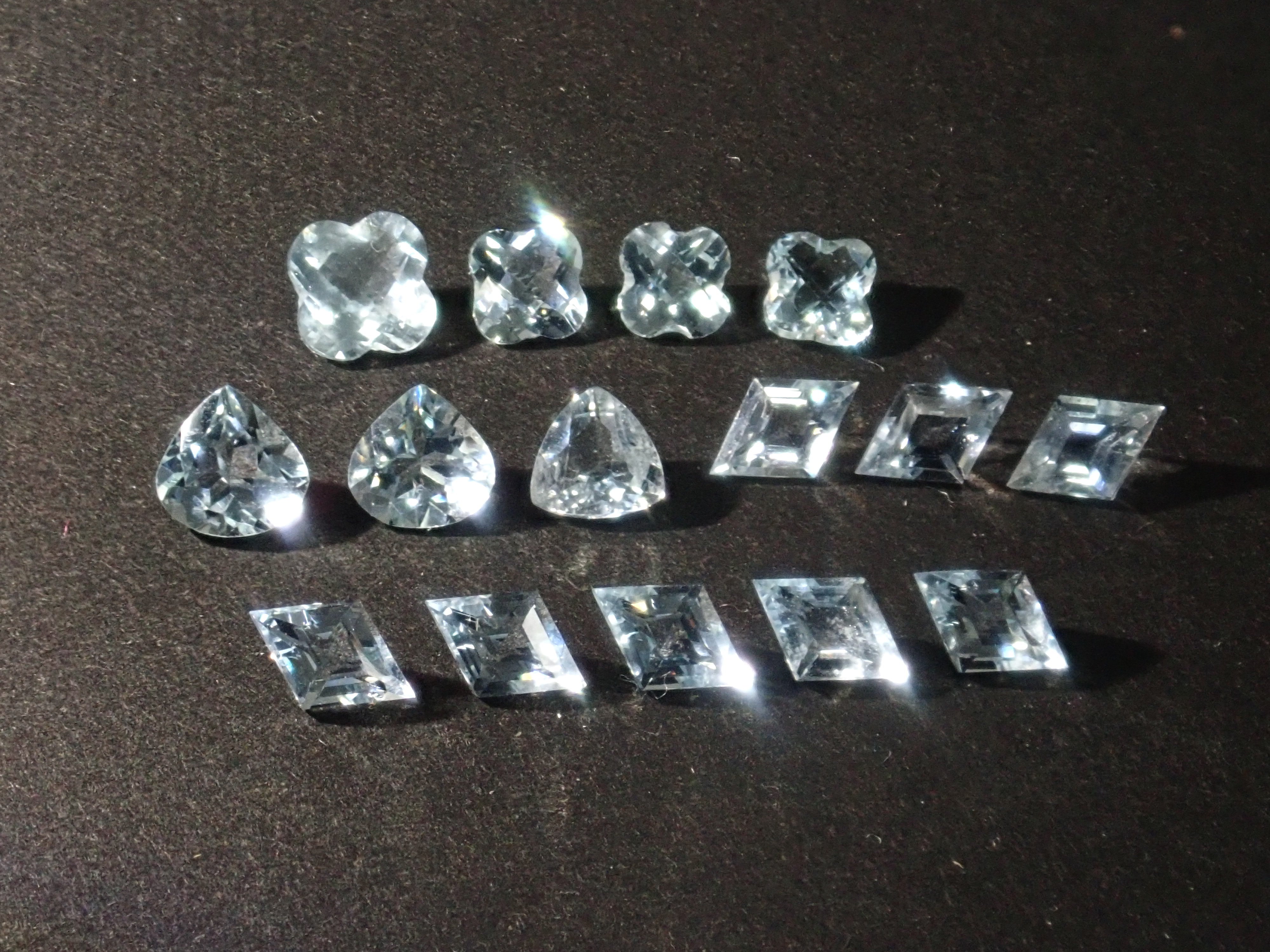 Limited to 15 stones: Mozambique aquamarine rough + 2 loose stones set. Discounts available for multiple purchases.