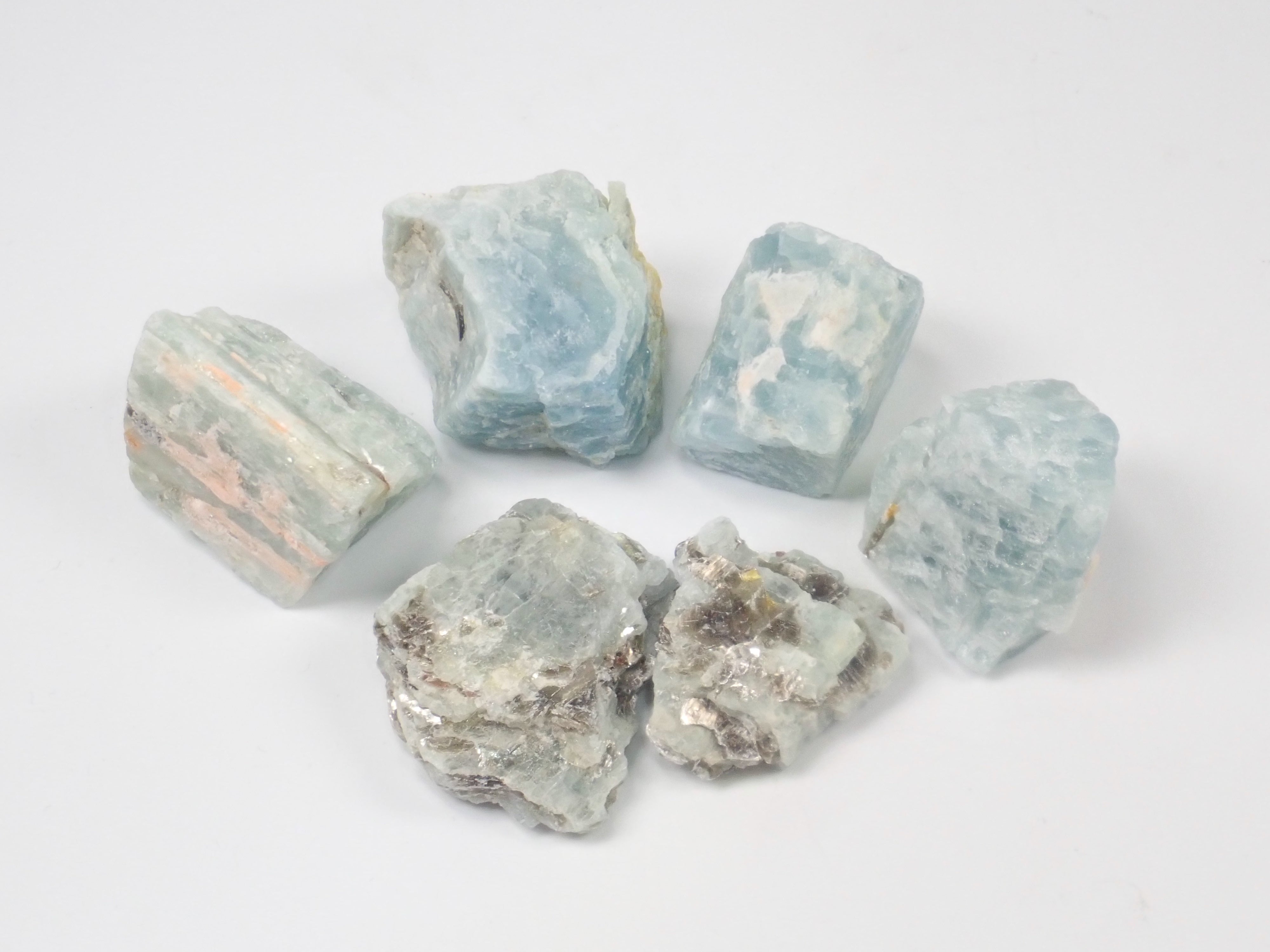 Limited to 15 stones: Mozambique aquamarine rough + 2 loose stones set. Discounts available for multiple purchases.