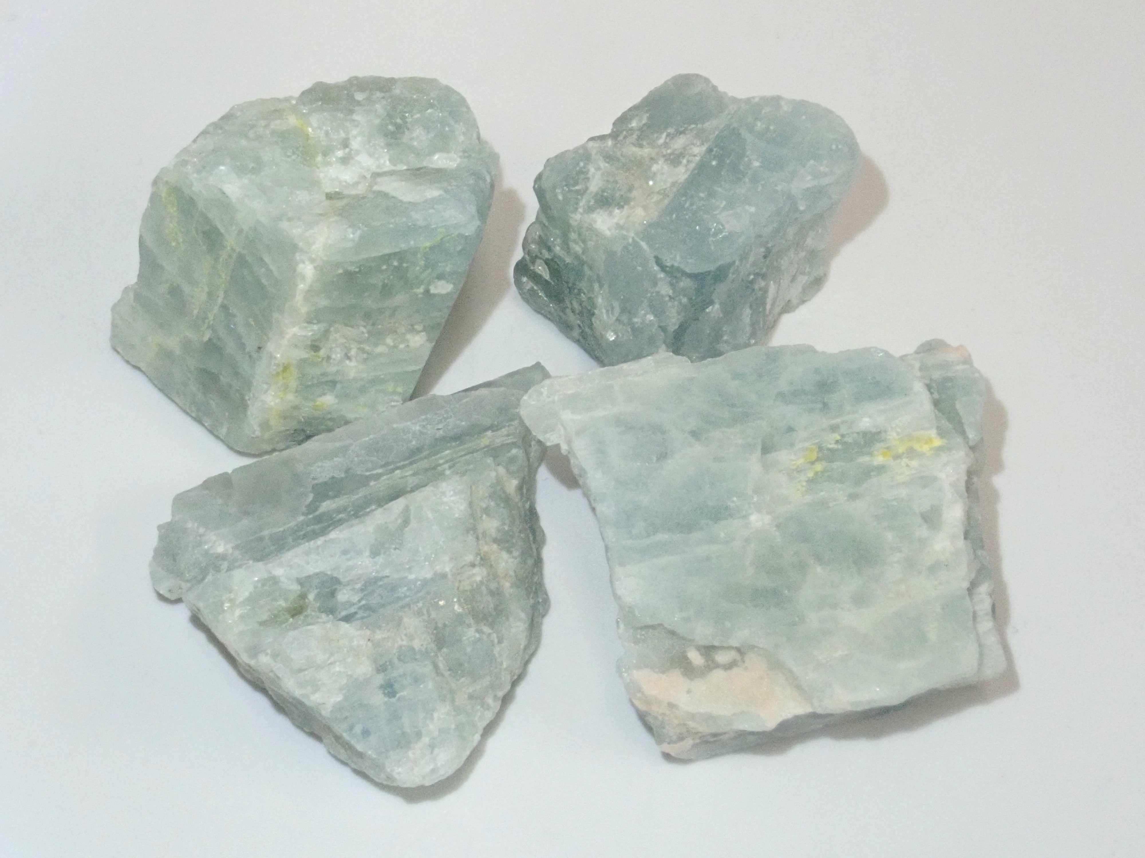 Limited to 15 stones: Mozambique aquamarine rough + 2 loose stones set. Discounts available for multiple purchases.