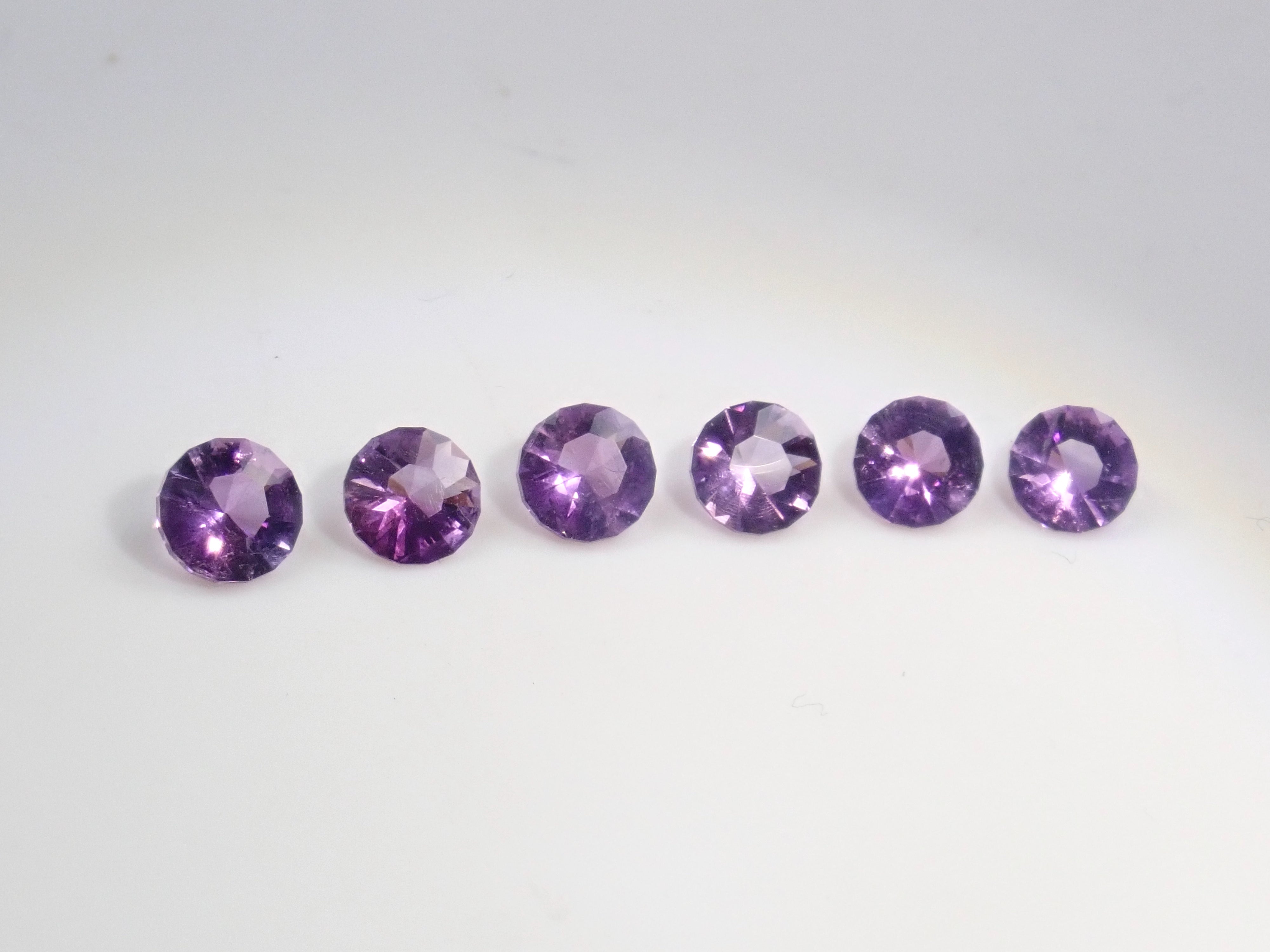 Limited to 6 stones: 1 Brazilian amethyst loose stone (5mm, round cut) Multiple purchase discounts available