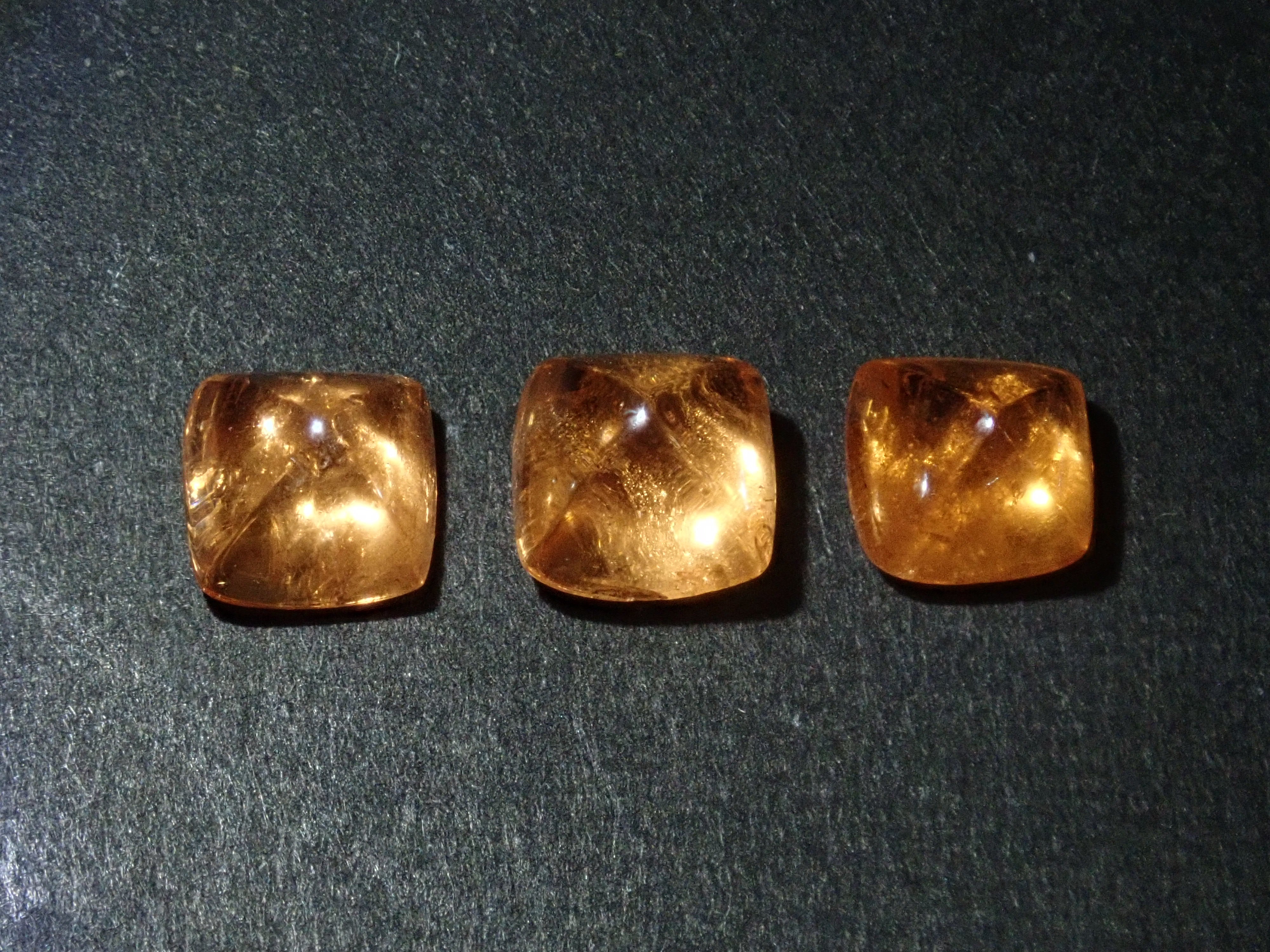 Limited to 3 stones: Tanzanian mandarin garnet (sugarloaf cut) 1 loose stone (multiple purchase discounts available)