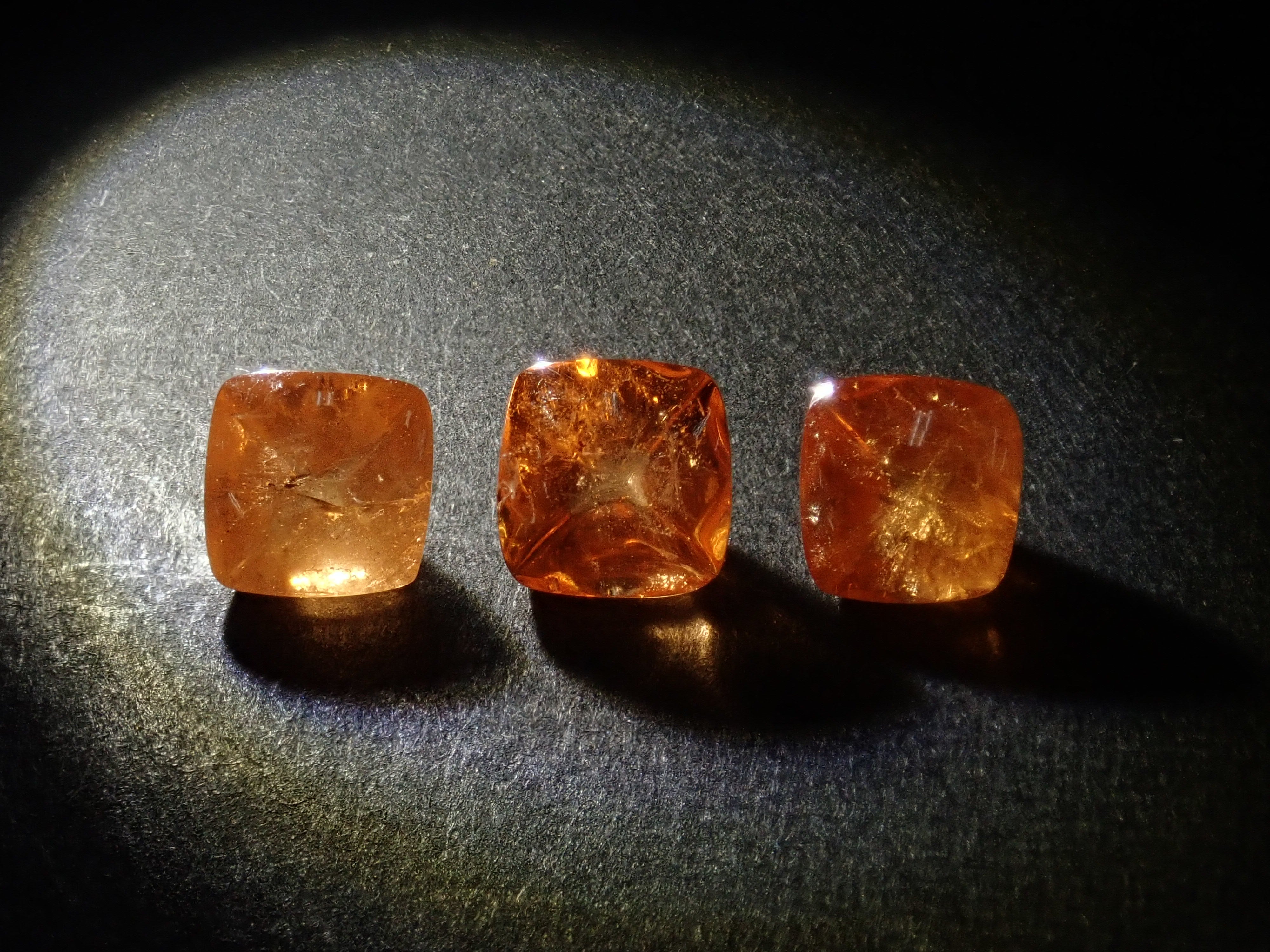 Limited to 3 stones: Tanzanian mandarin garnet (sugarloaf cut) 1 loose stone (multiple purchase discounts available)